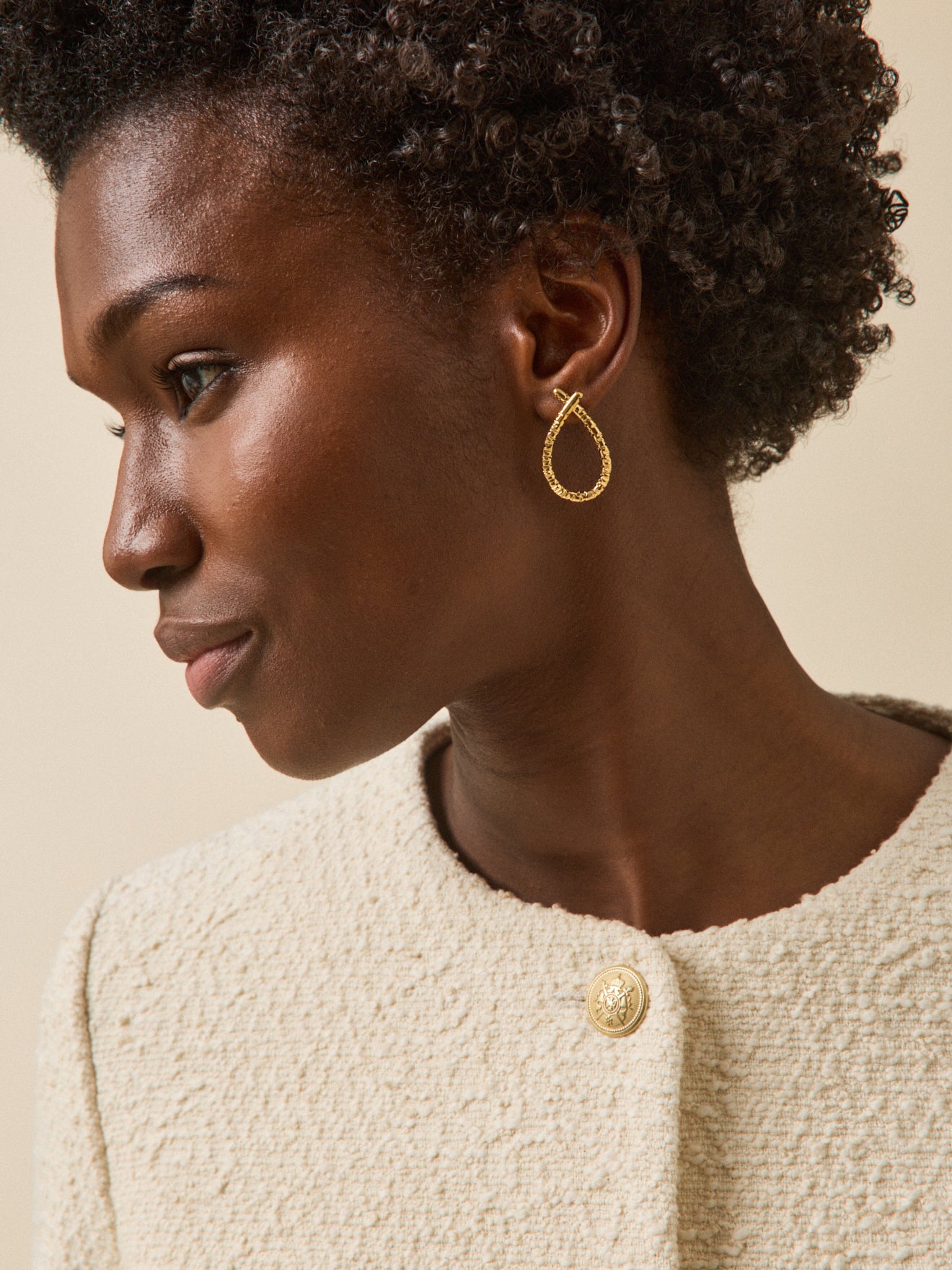 Damesjasje zonder kraag in effen tweed