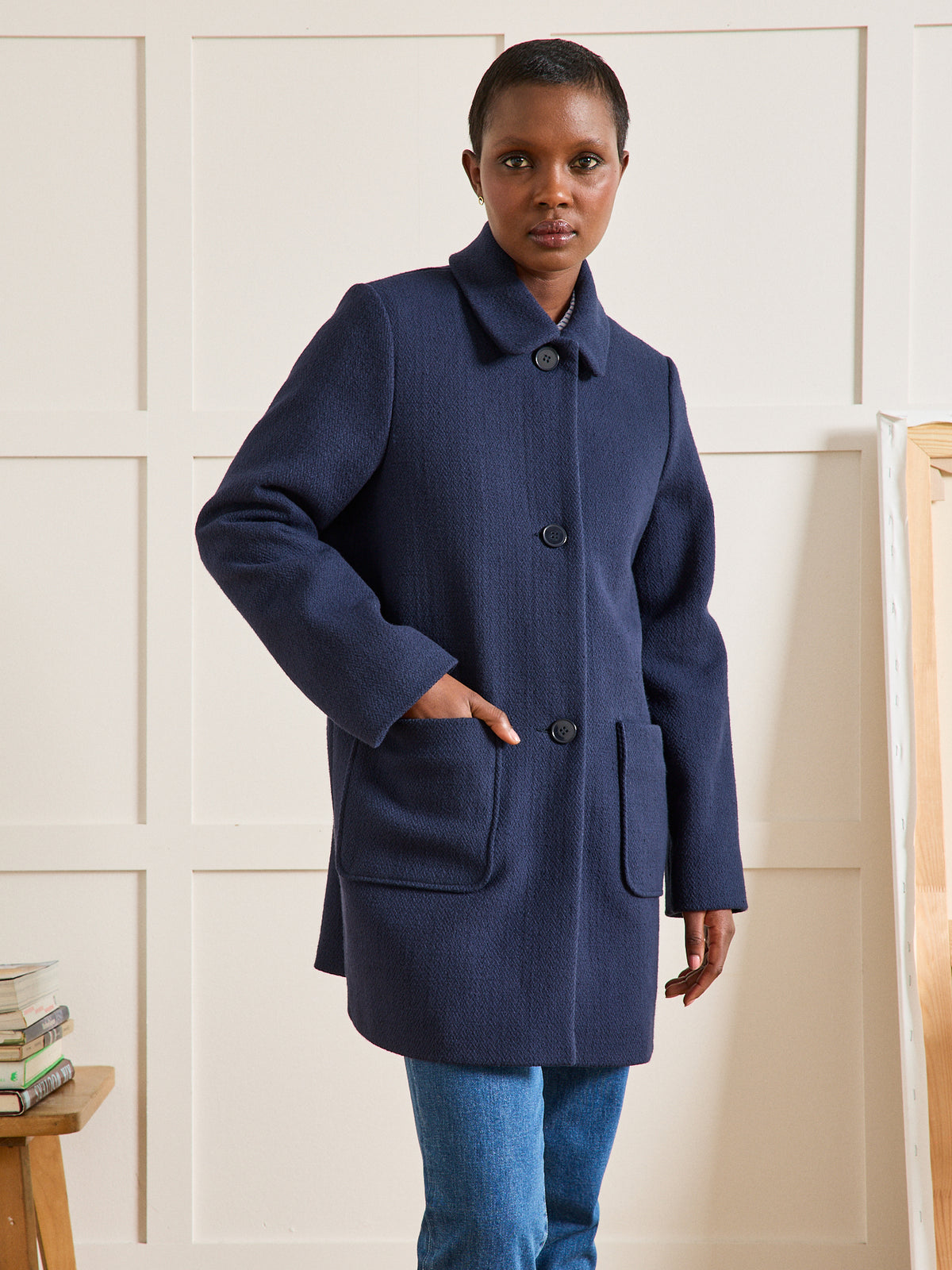 Damesmantel in effen structuurstof