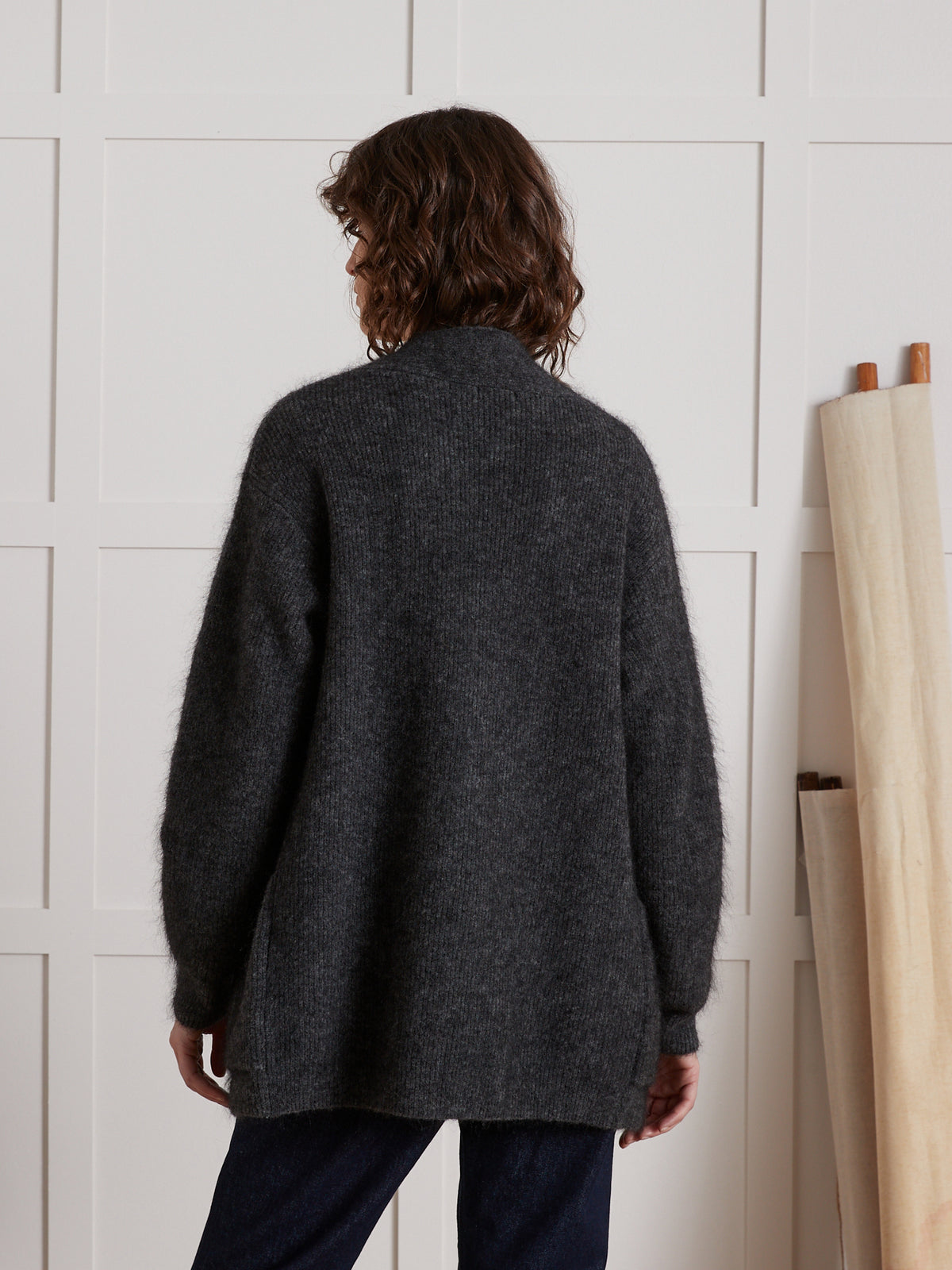 Lang damesvest in chiné tricot