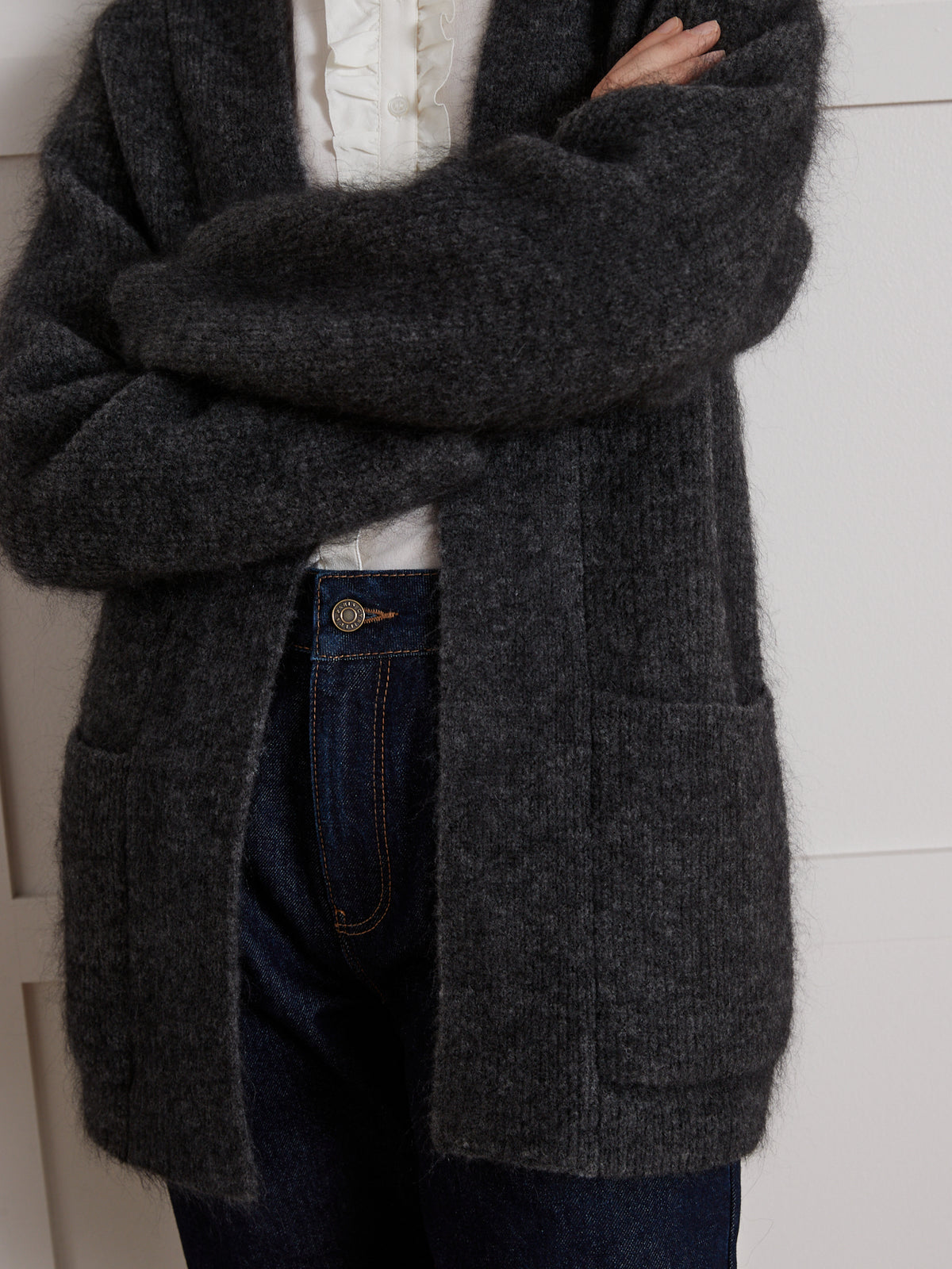 Lang damesvest in chiné tricot