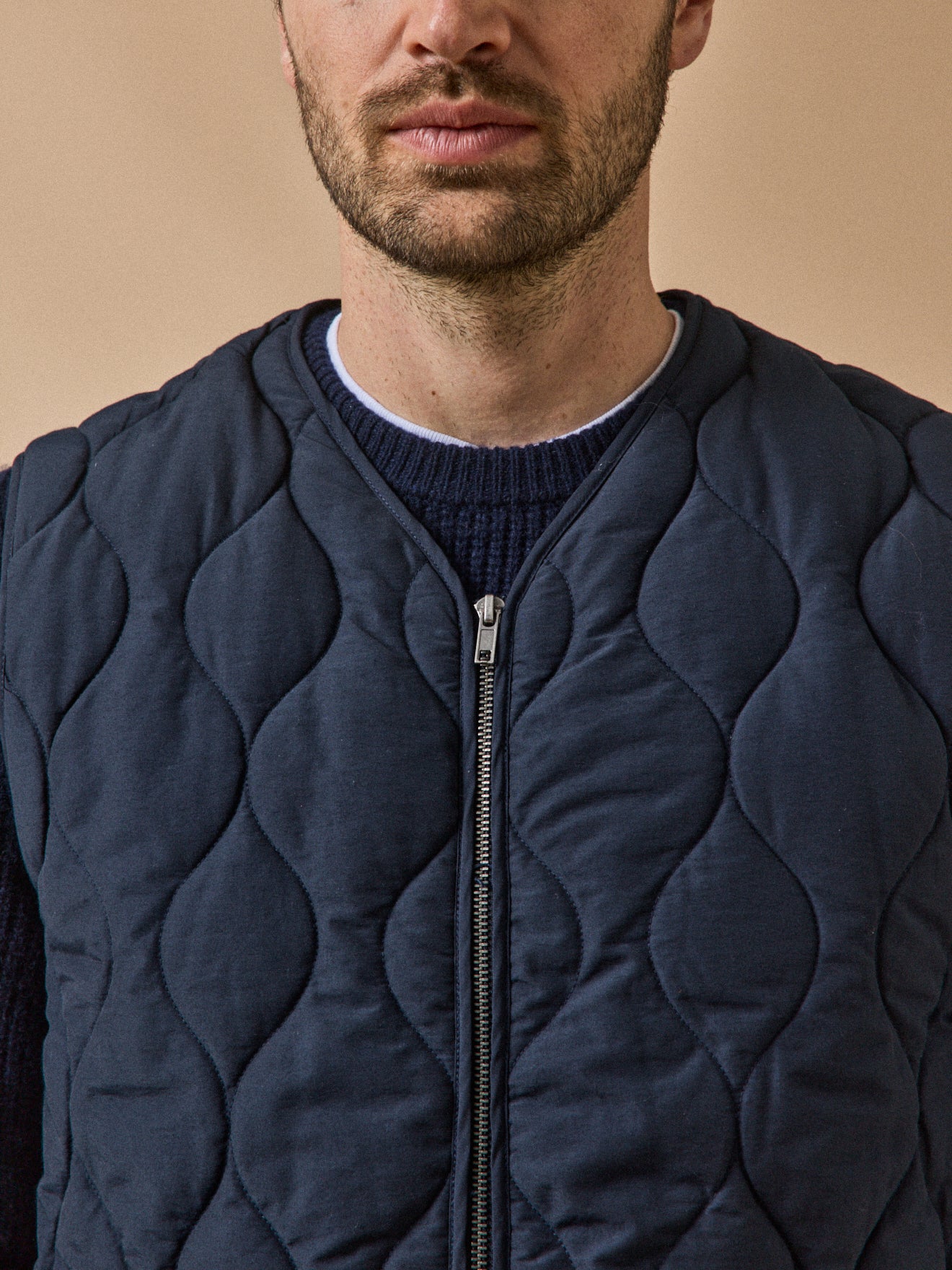 Gematelasseerde herenbodywarmer met rits