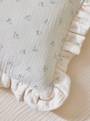 Coussin volanté en gaze de coton