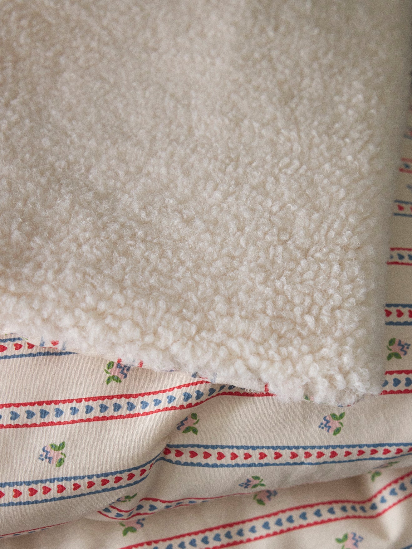 Omkeerbare print - sherpa en Avril-print