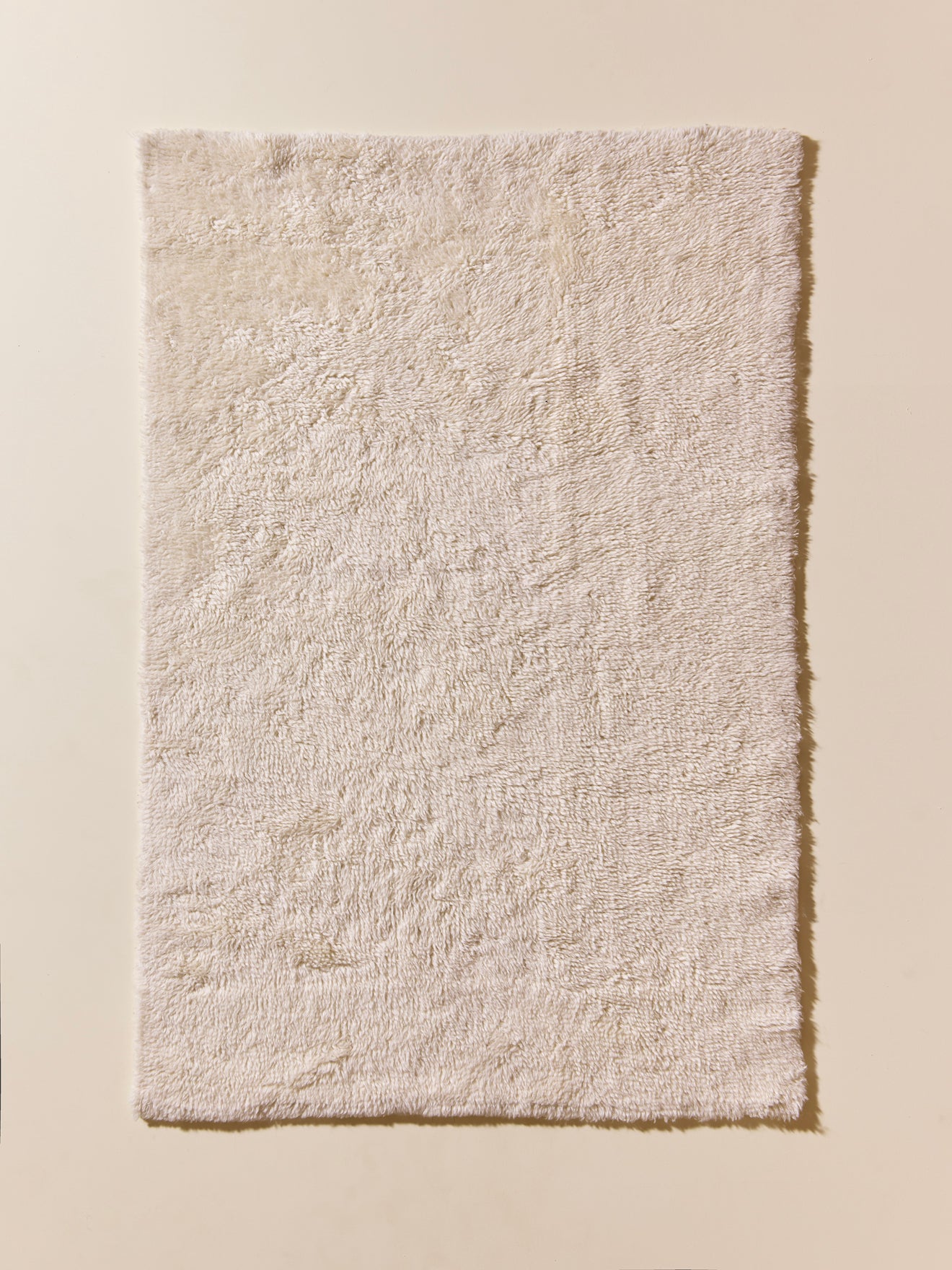 Petit tapis poils longs pure laine