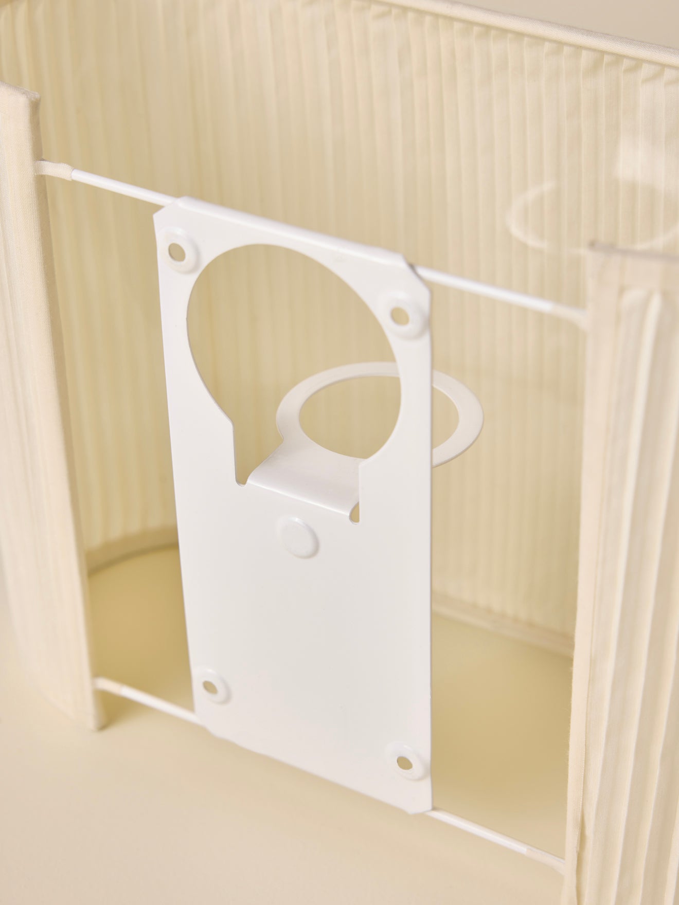 Ovaalvormige wandlamp met plooitjes