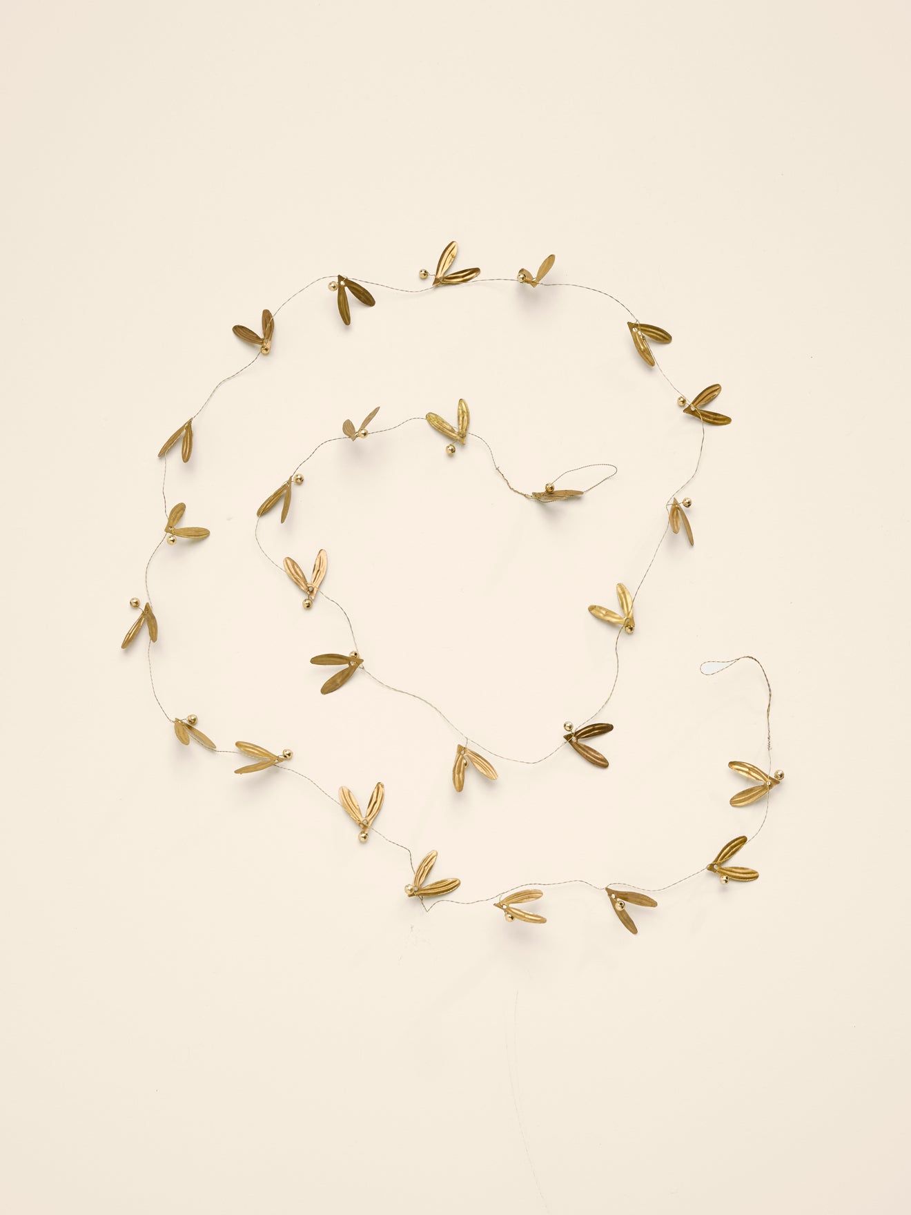 Maretakslinger in messing