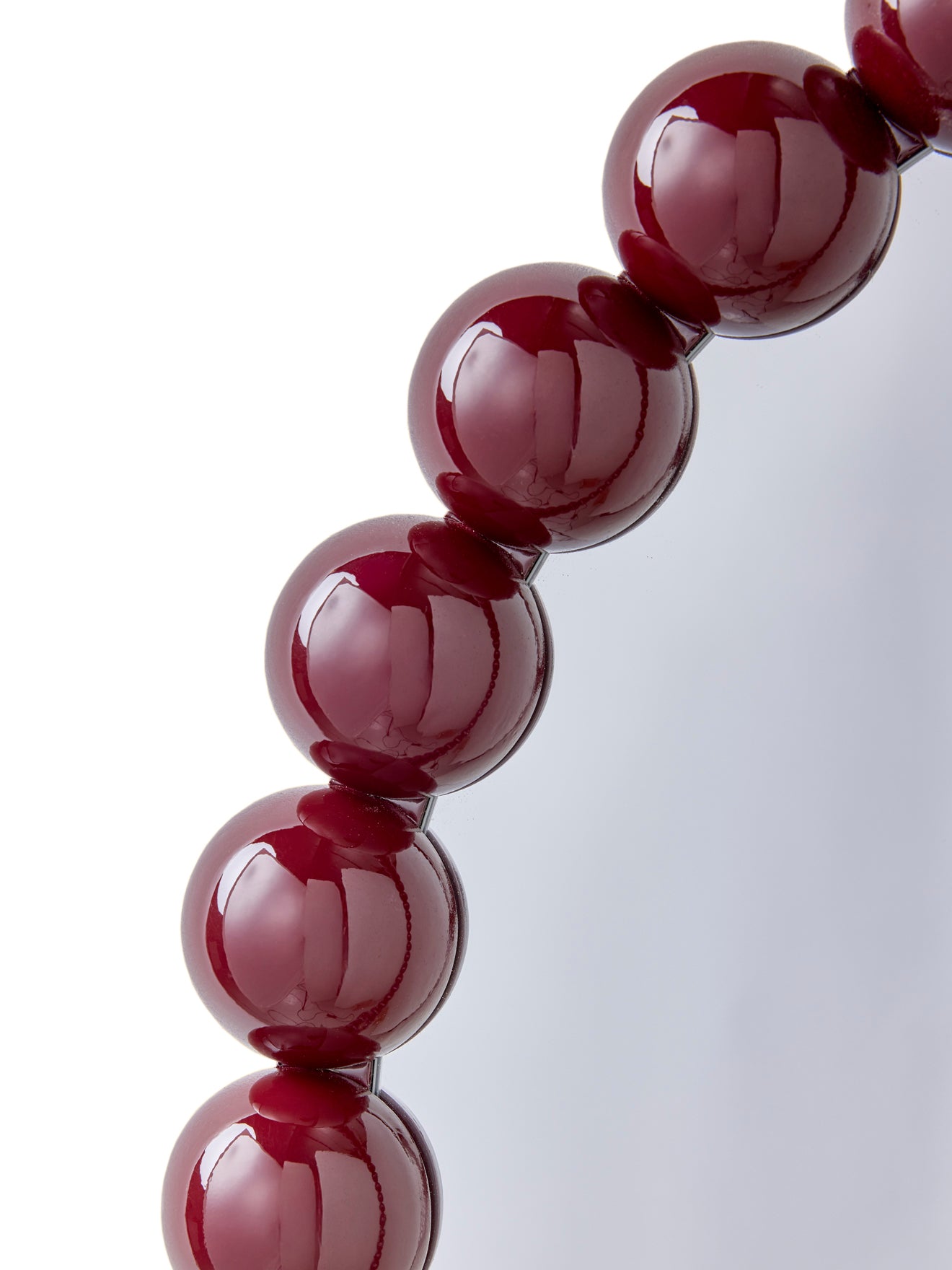 Miroir rond contour boules en bois