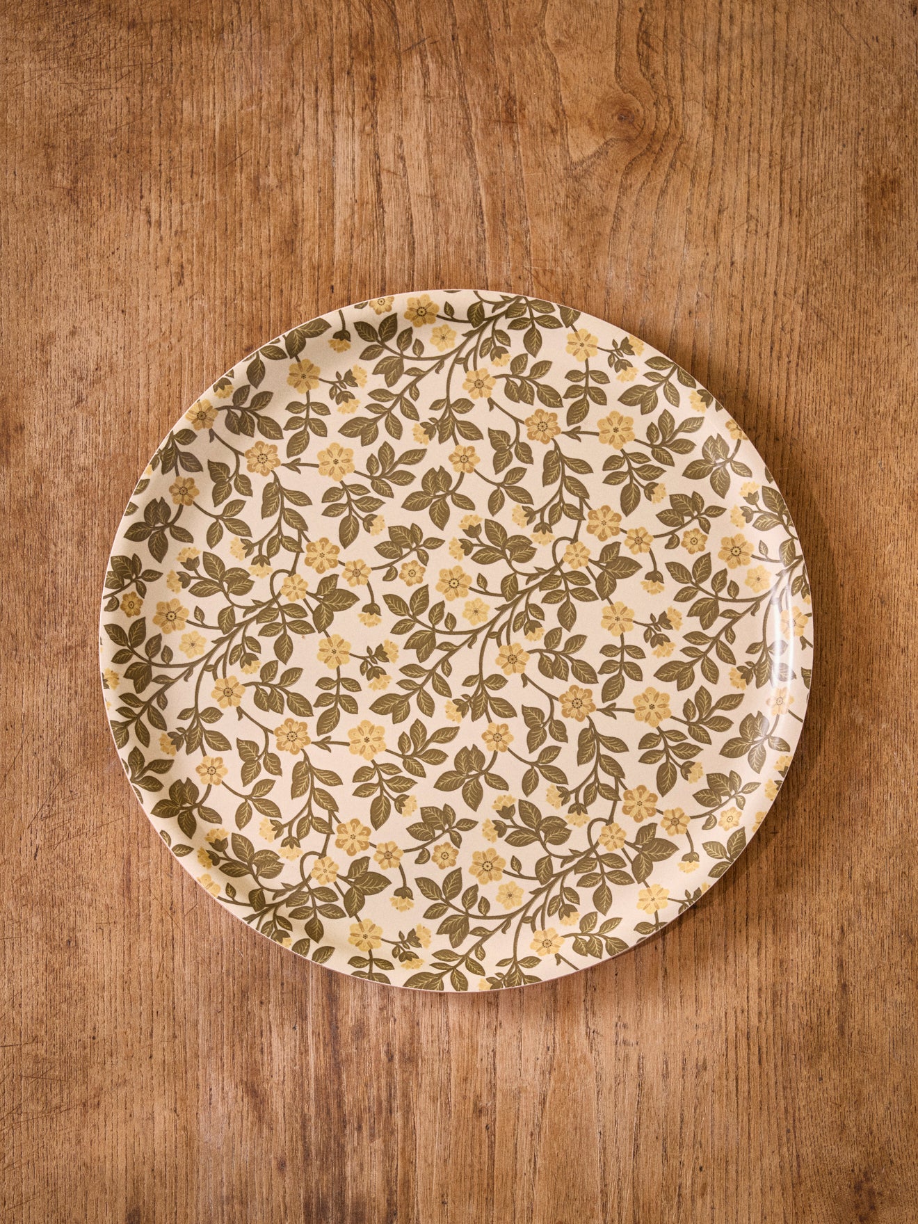 Rond houten dienblad met bloemenmotief