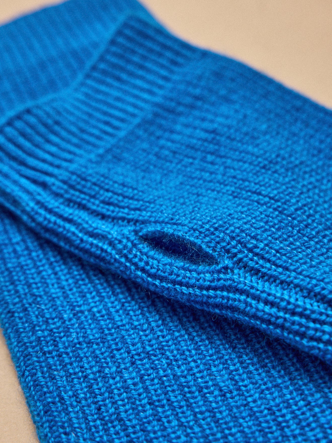 Damespolswarmers in wol en kasjmier