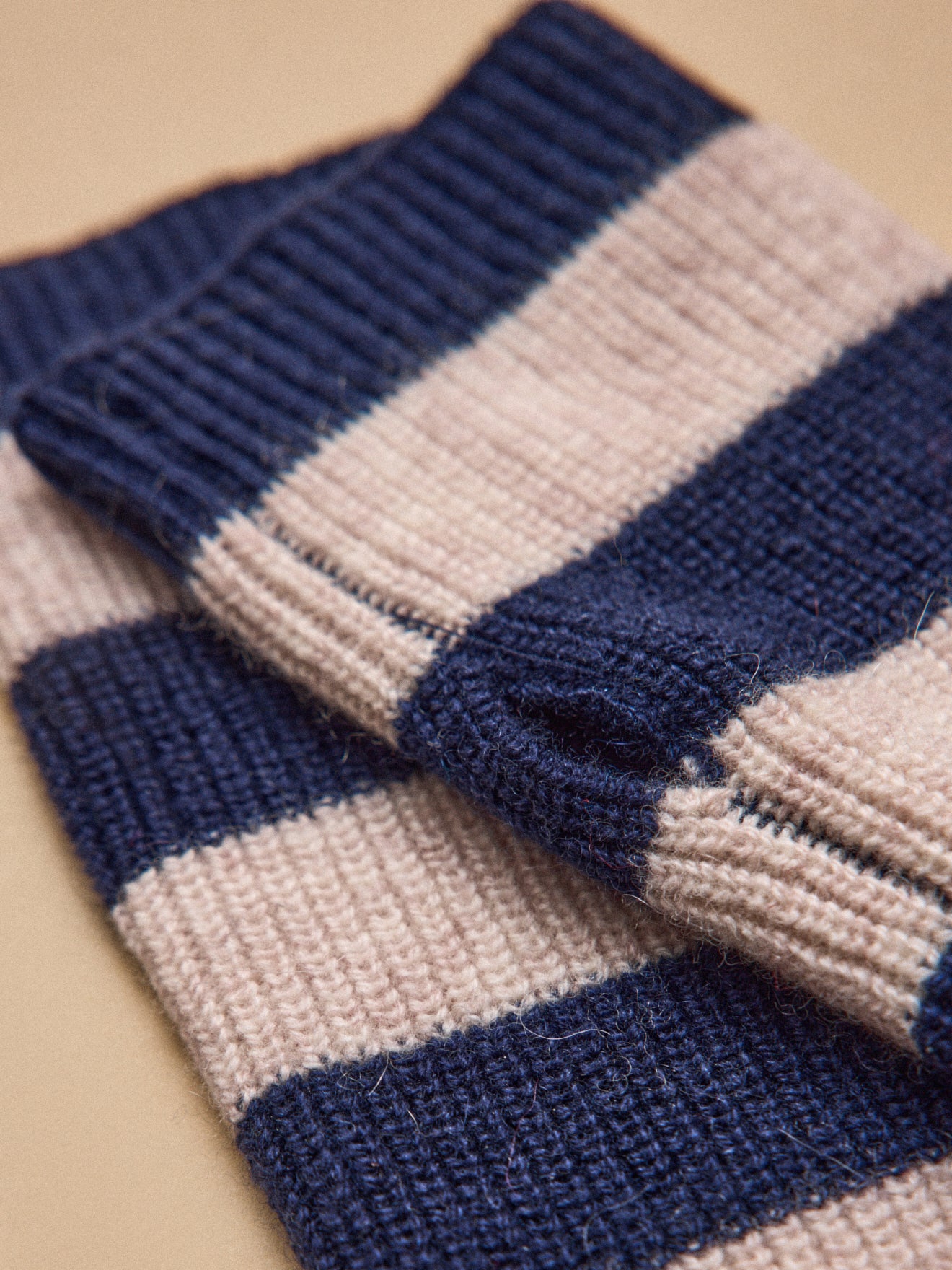 Damespolswarmers in wol en kasjmier