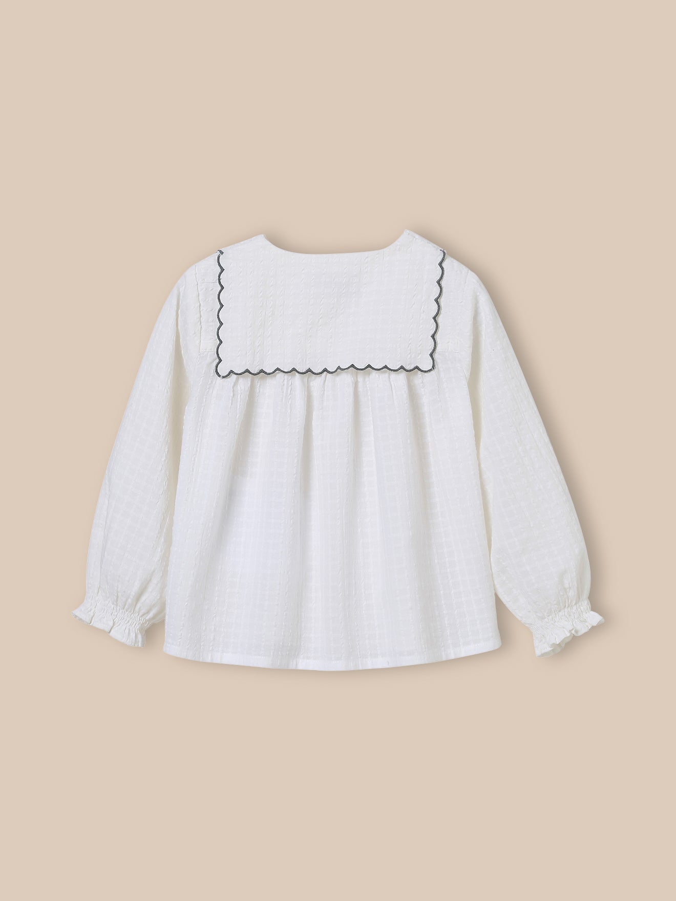 Babybloesje met geborduurde kraag