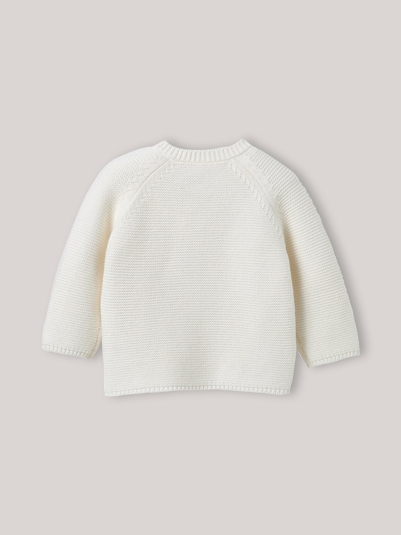 Babycardigan in biokatoen en wol