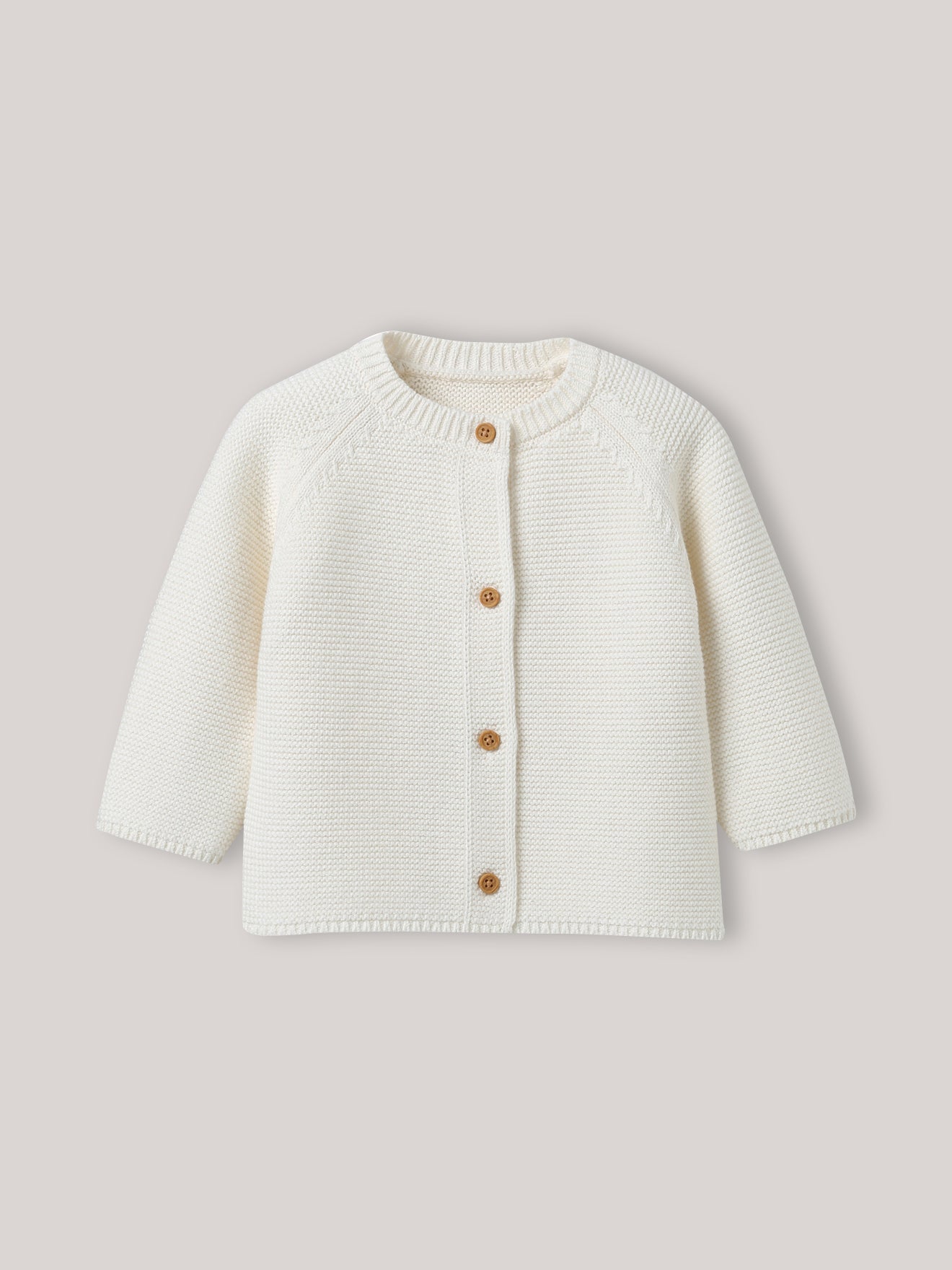 Babycardigan in biokatoen en wol