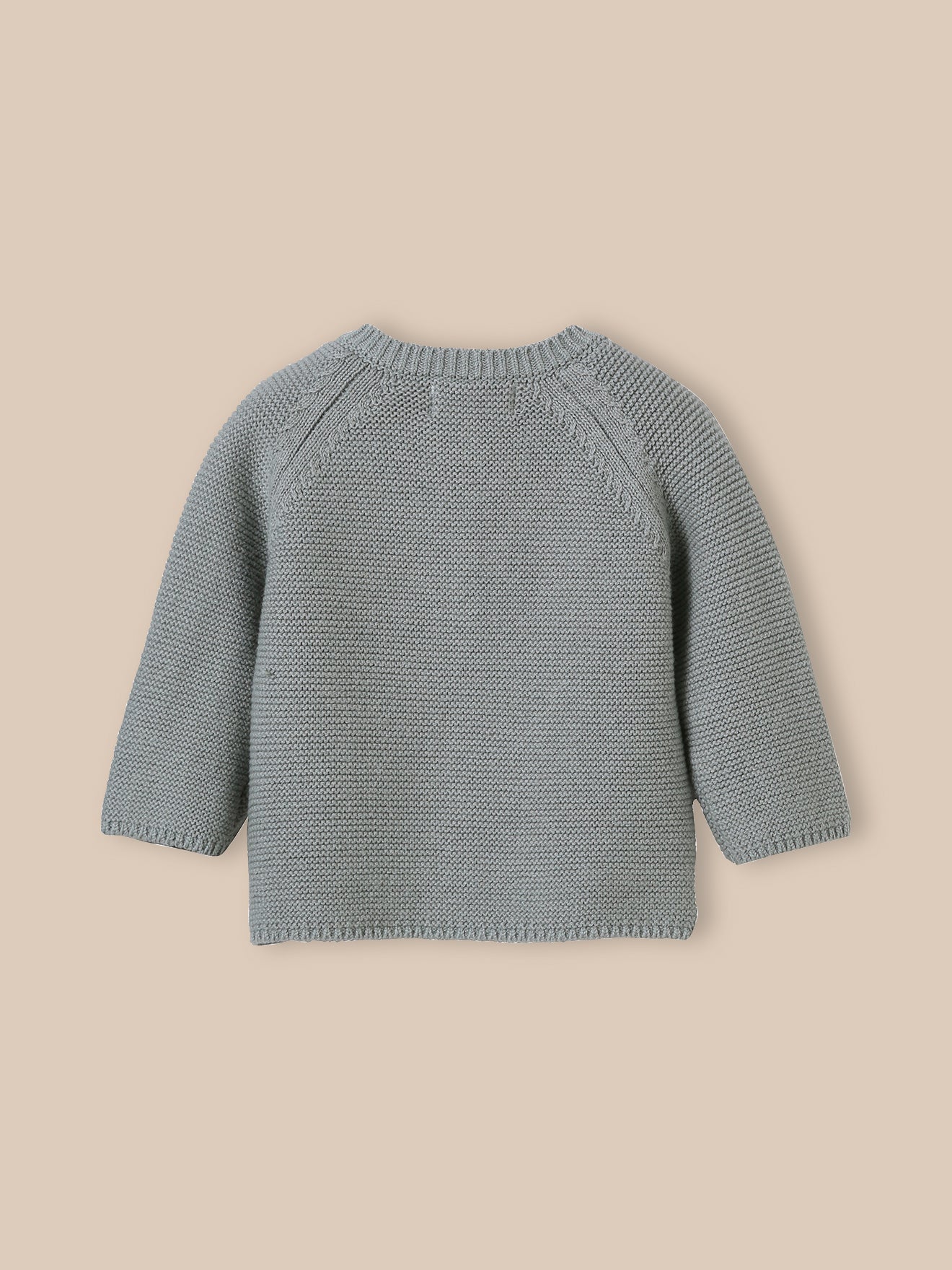 Babycardigan in biokatoen en wol