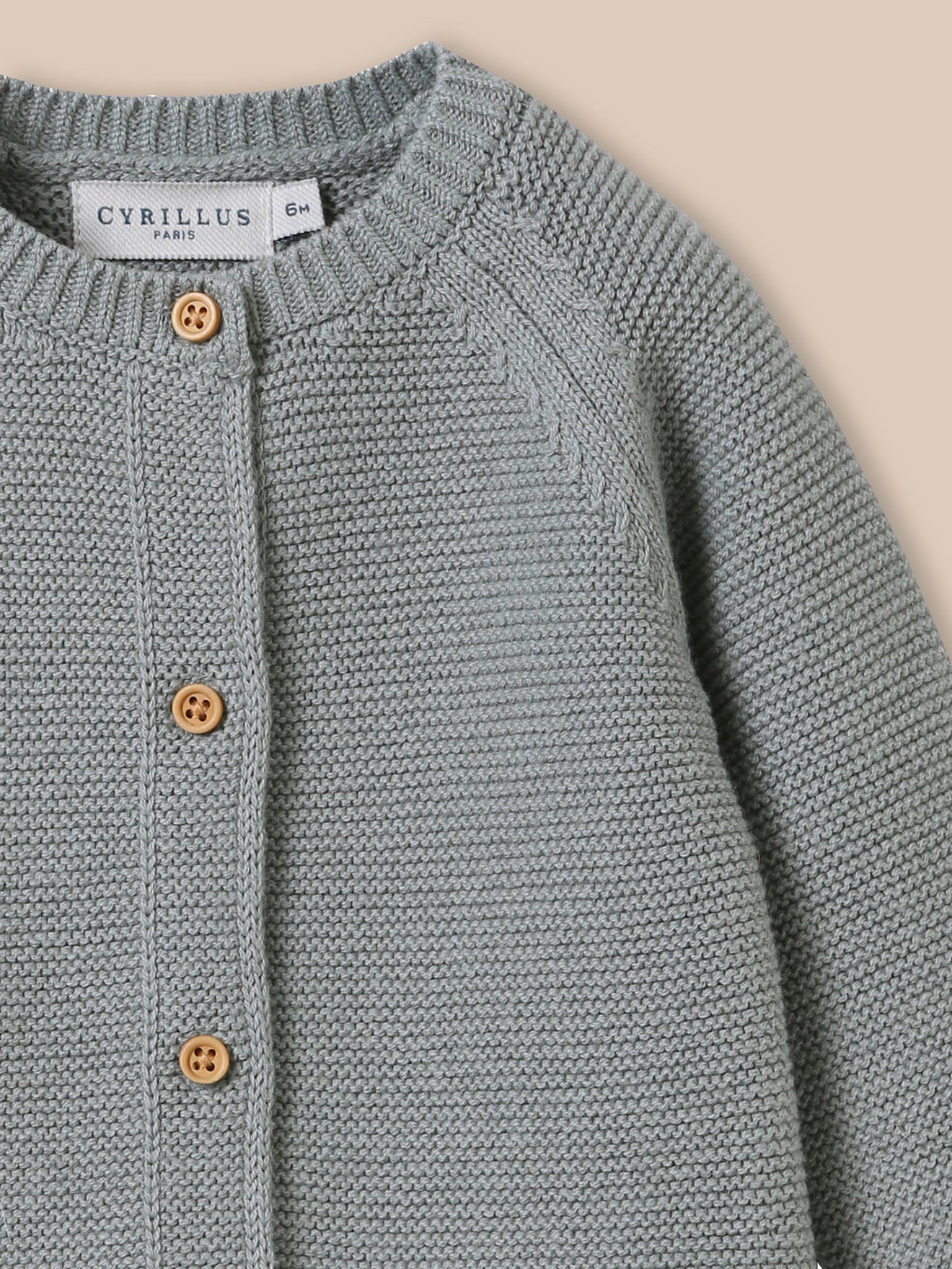 Babycardigan in biokatoen en wol