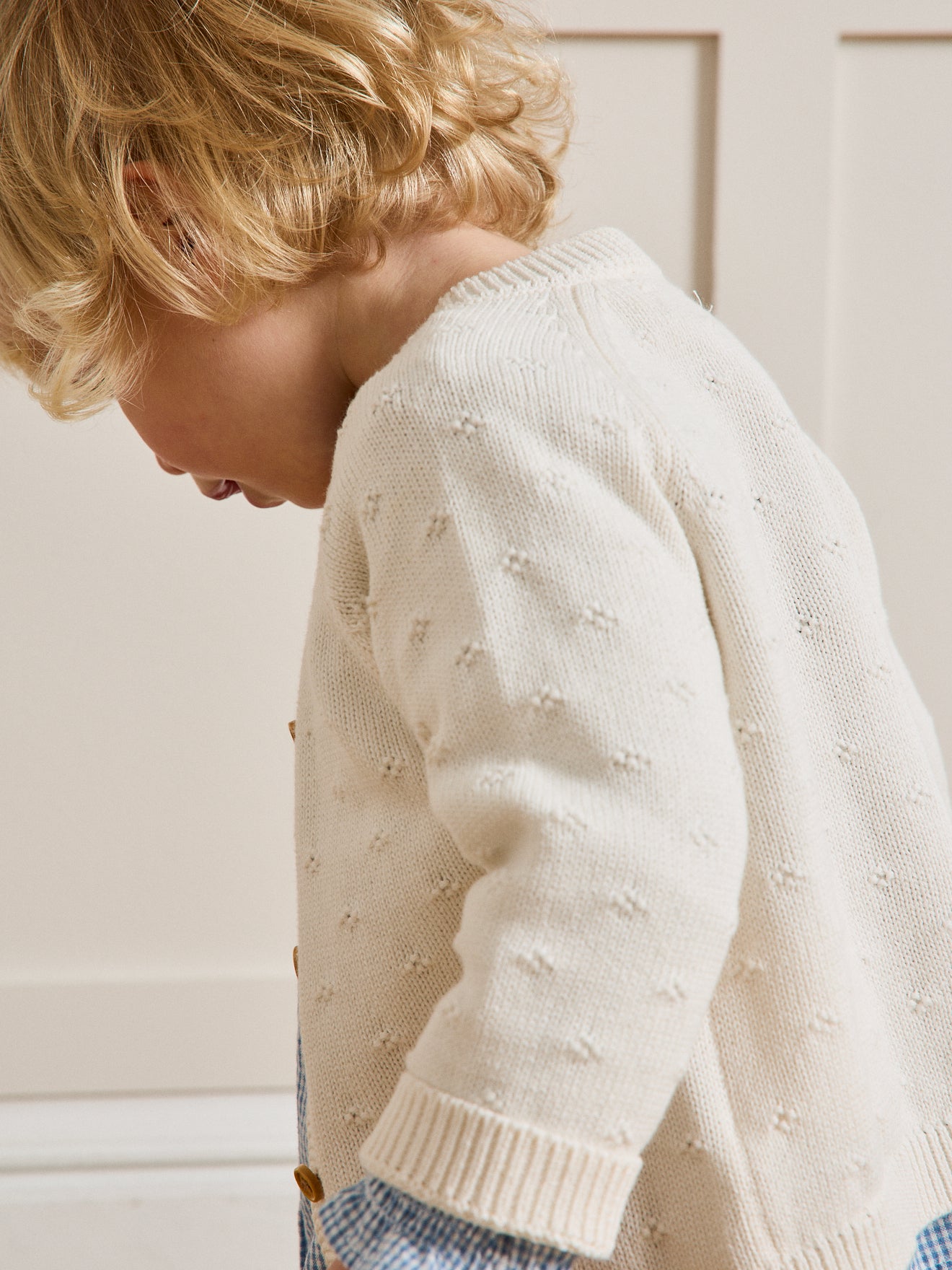 Babycardigan in ajourtricot - Biokatoen