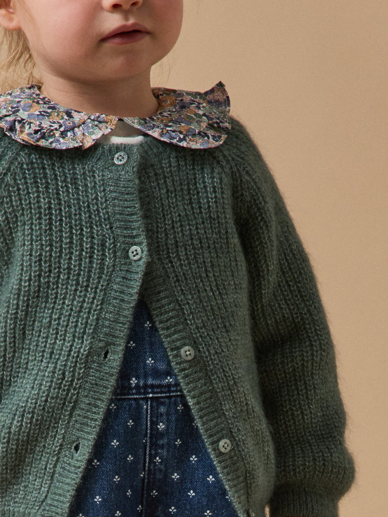 Babycardigan in pareltricot van mohair en wol