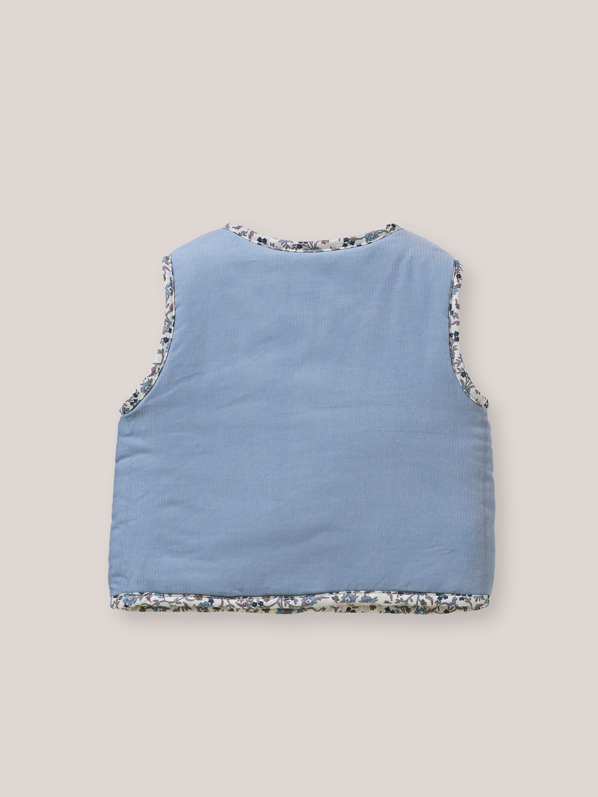 Omkeerbaar mouwloos babyvest