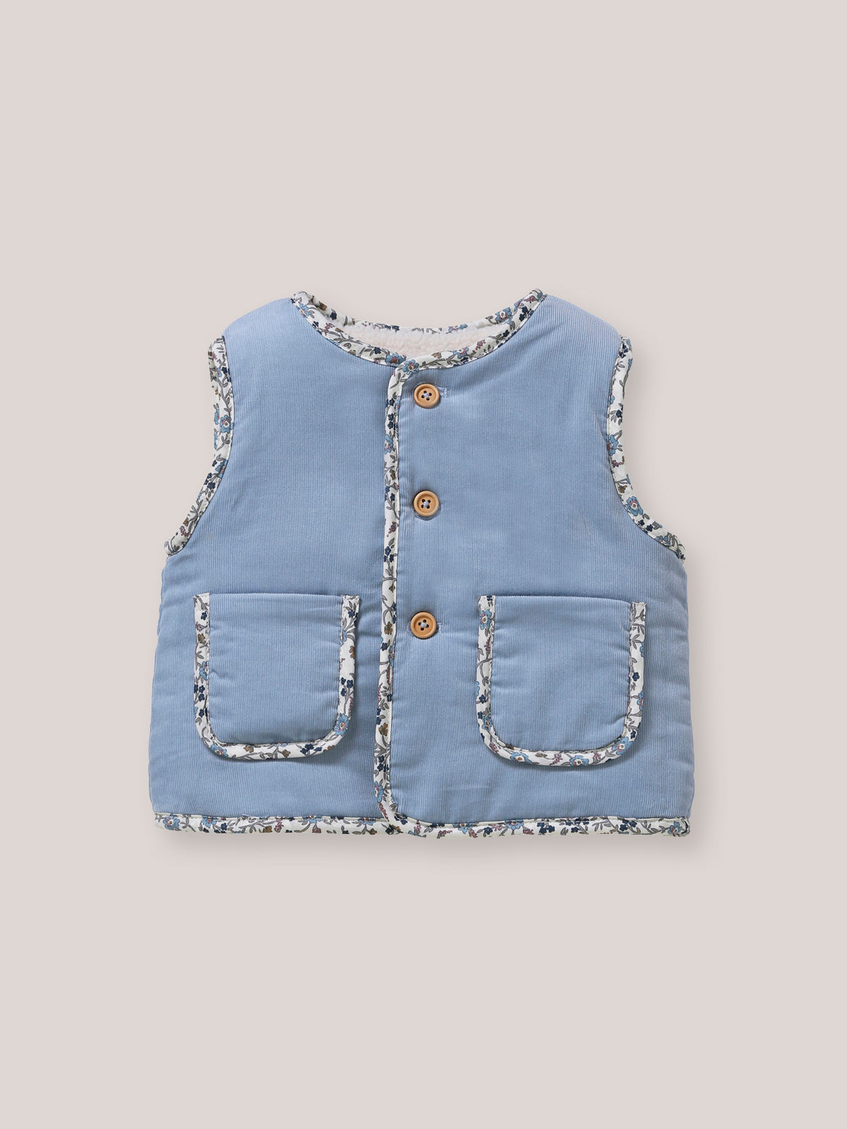 Omkeerbaar mouwloos babyvest