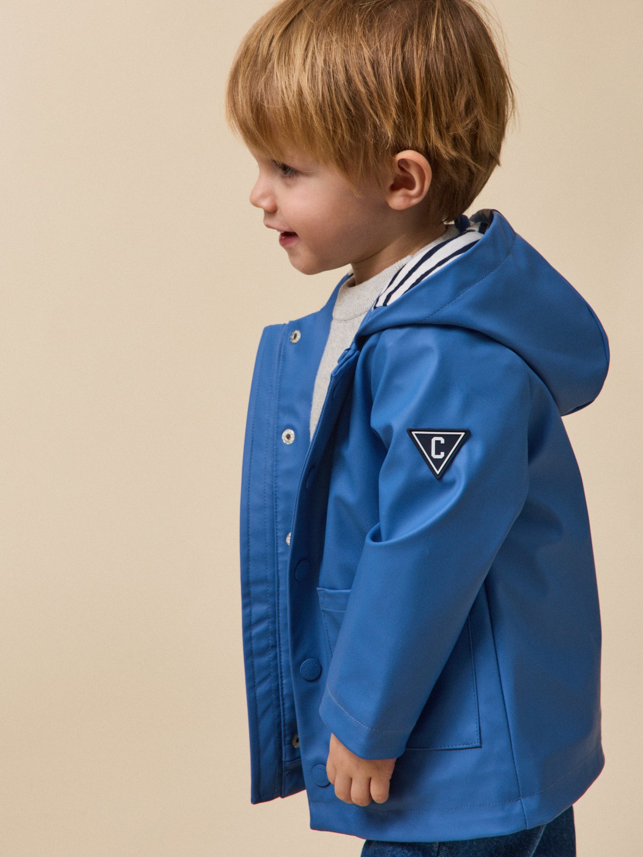 Babyregenjas met kap