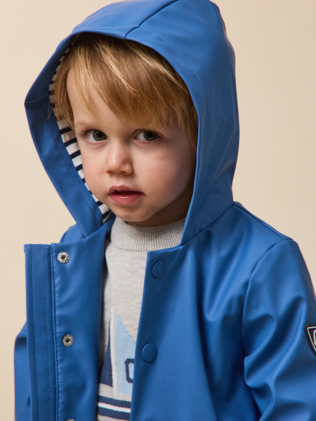 Babyregenjas met kap