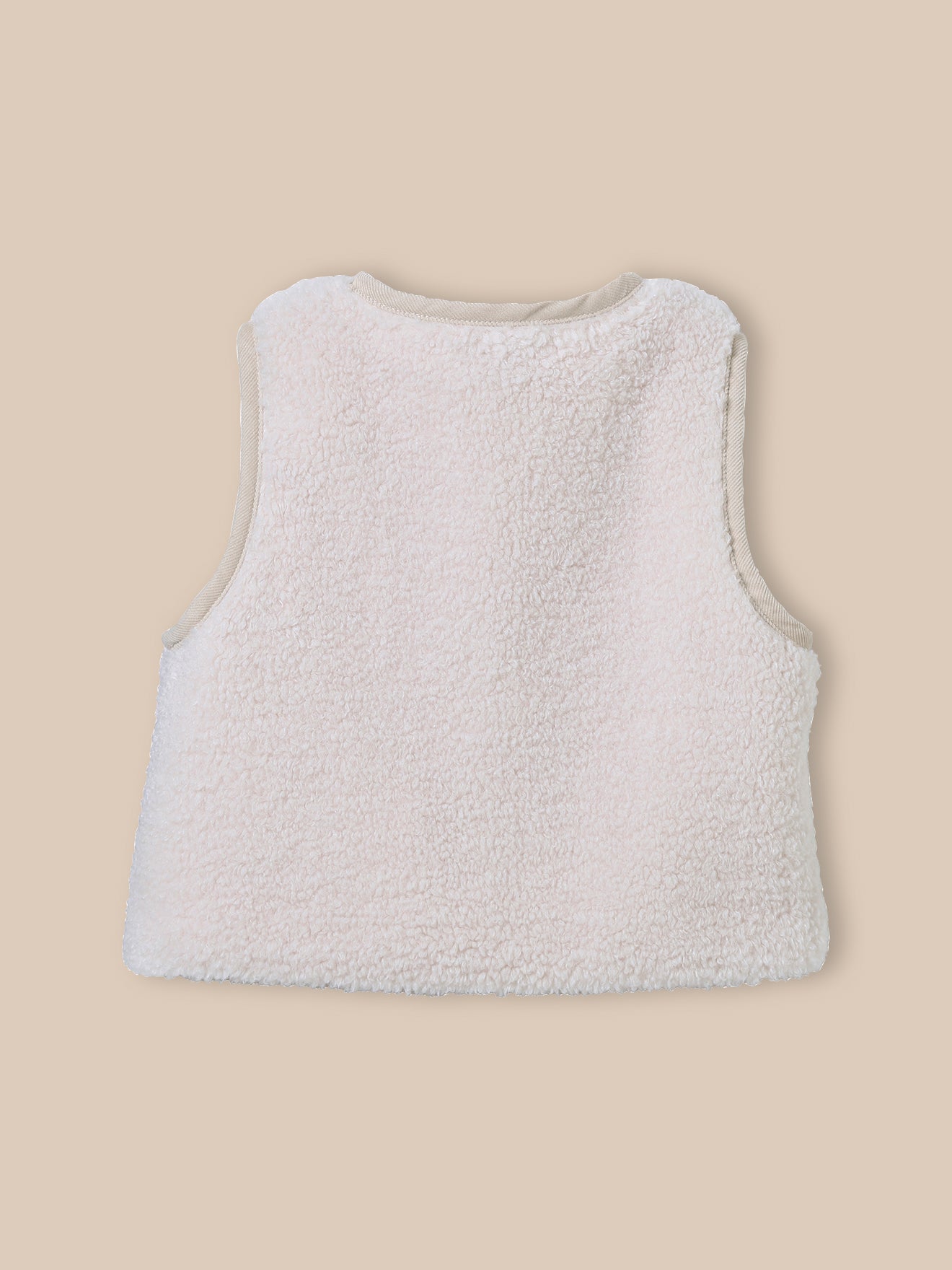 Mouwloos babyjasje in sherpa