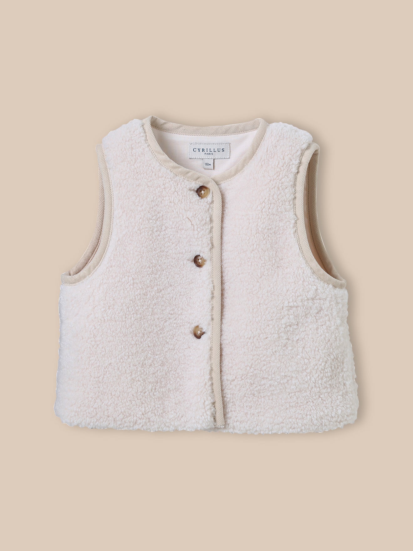 Mouwloos babyjasje in sherpa