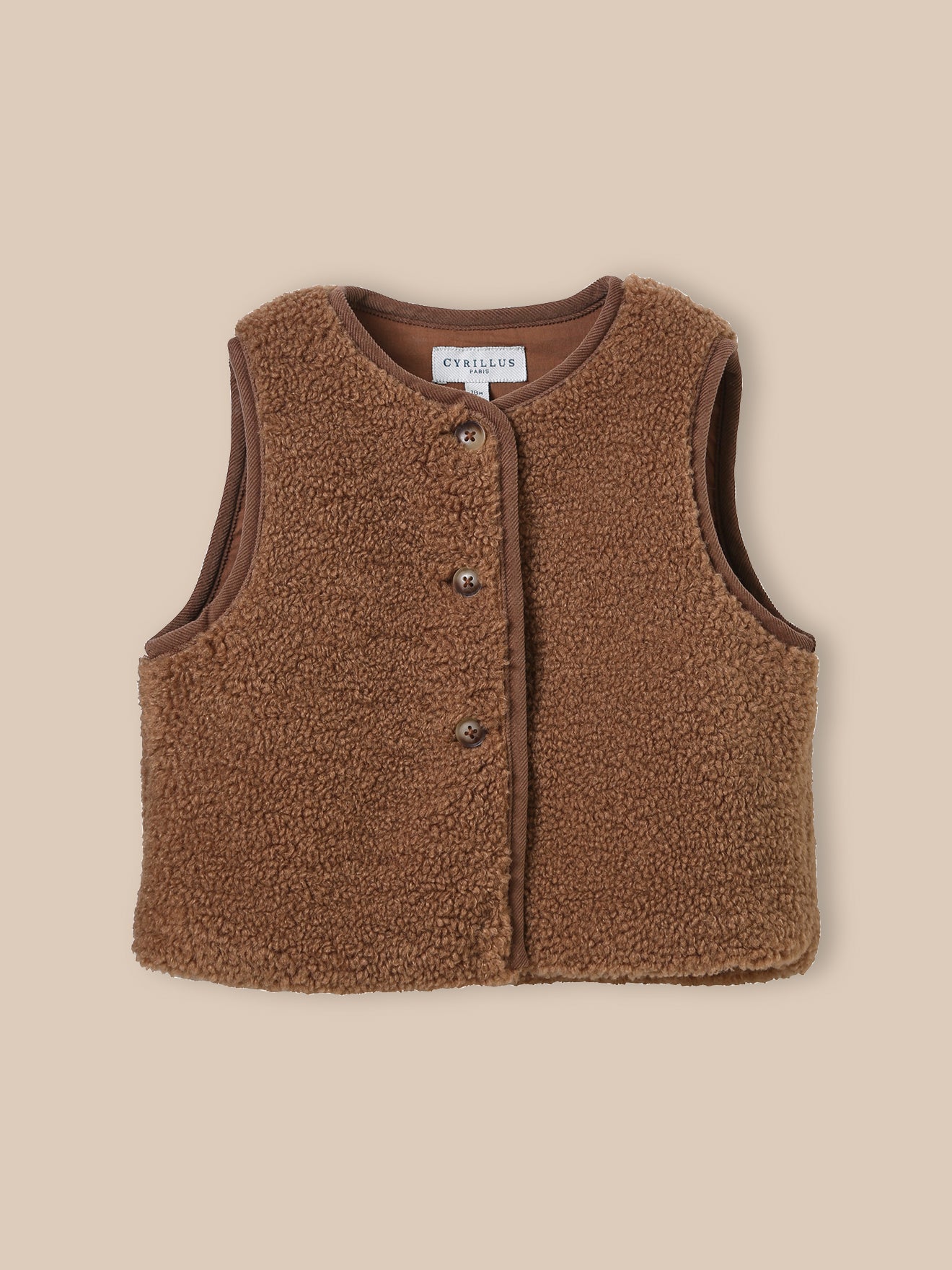 Mouwloos babyjasje in sherpa