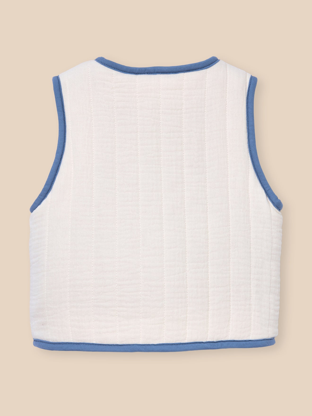 Omkeerbaar mouwloos babyvestje