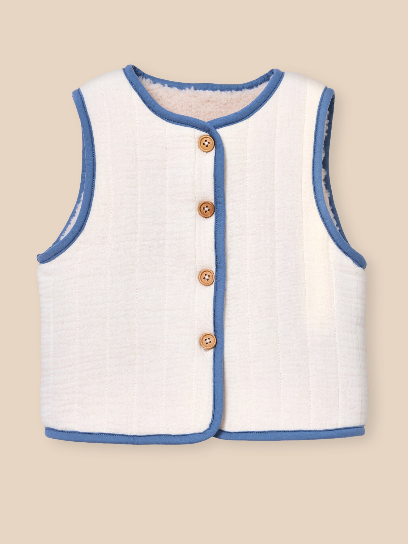 Omkeerbaar mouwloos babyvestje