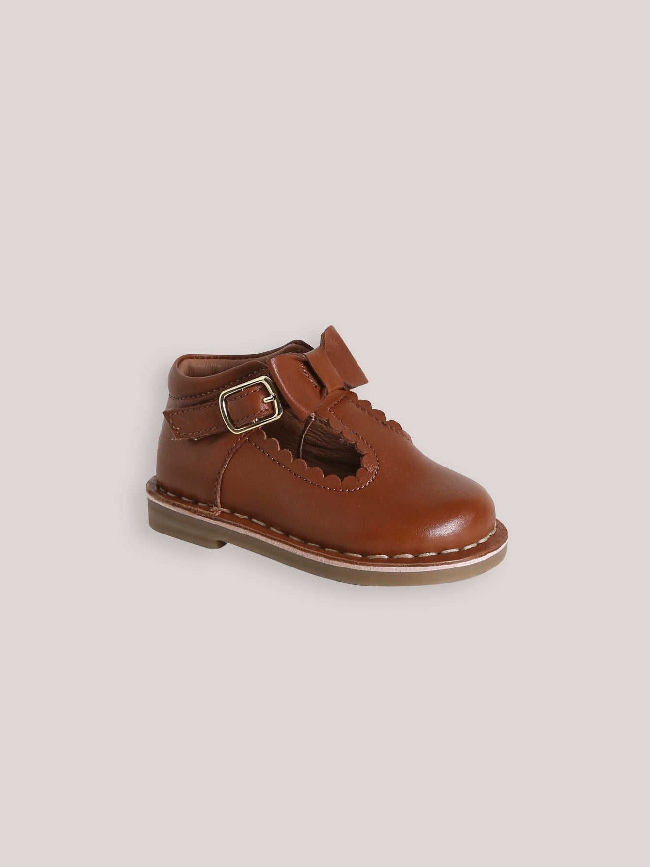 Leren babyschoenen in saloméstijl met strikje