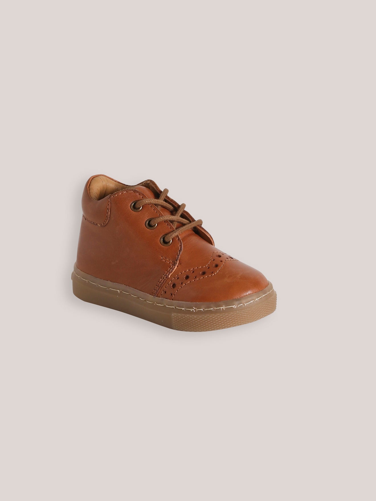 Leren babybottines met perforaties