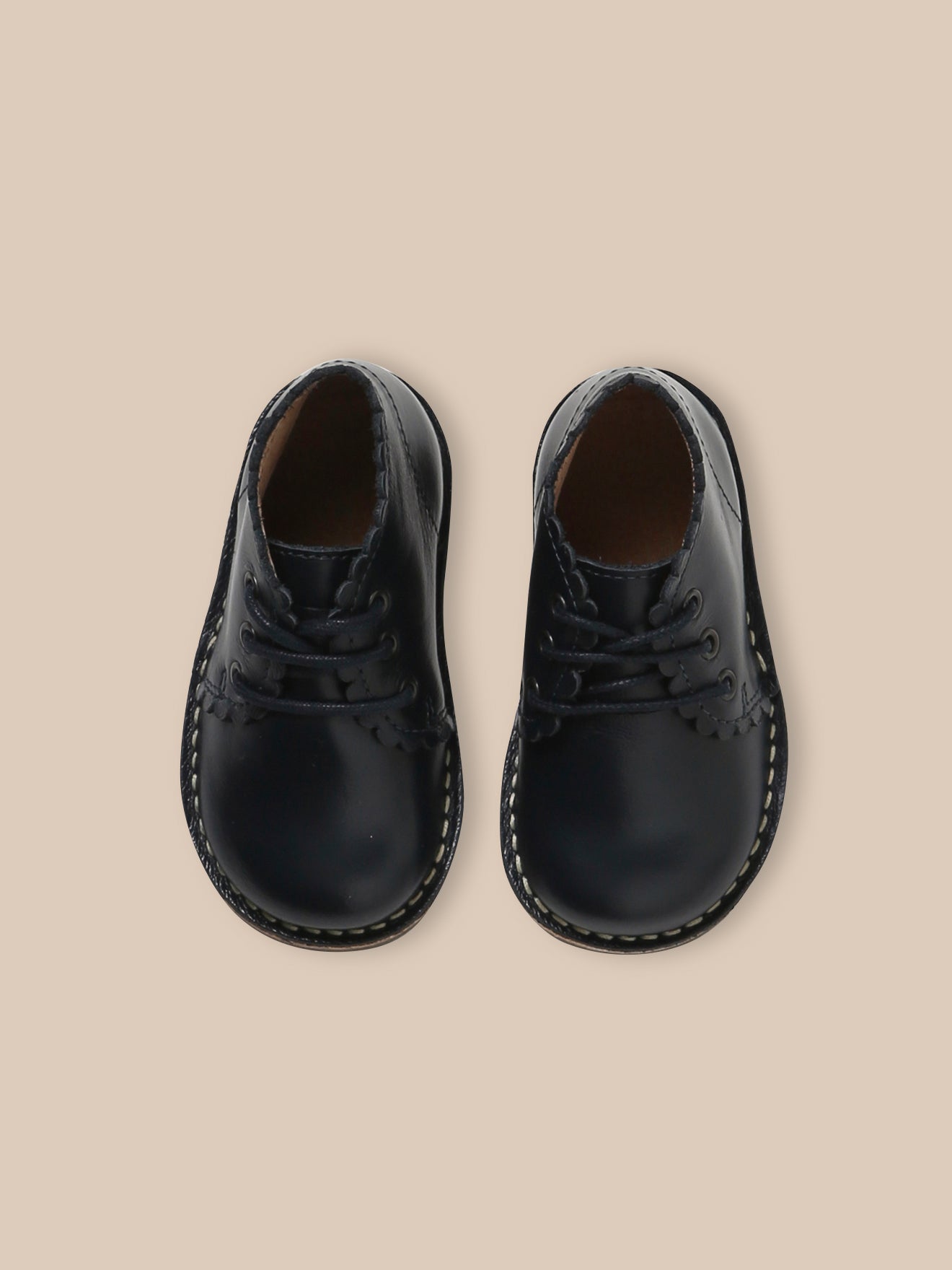 Geschulpte babybottines in leer