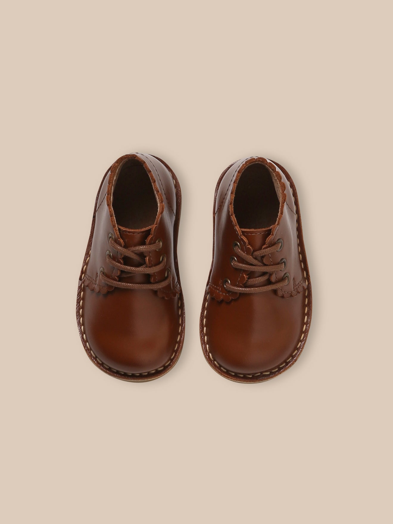 Geschulpte babybottines in leer