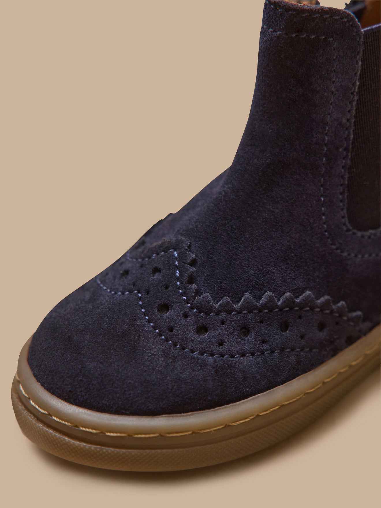 Leren babyboots met perforaties