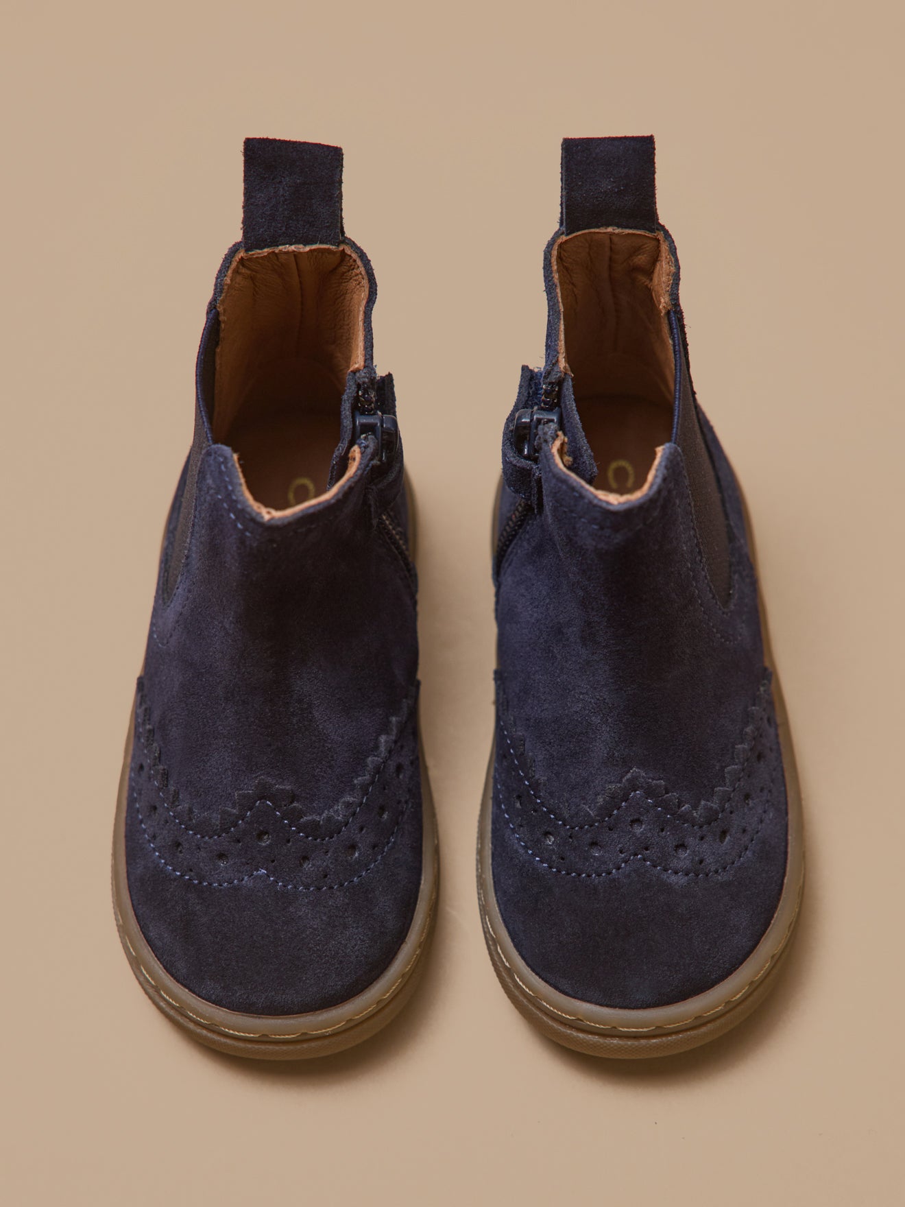 Leren babyboots met perforaties