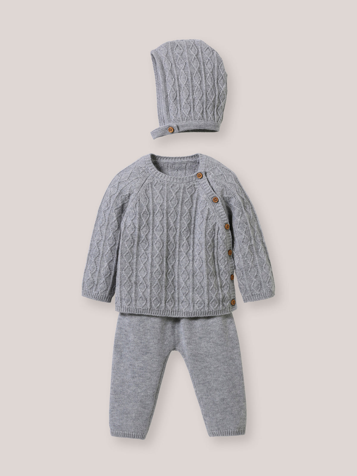 Wollen babypakje met muts