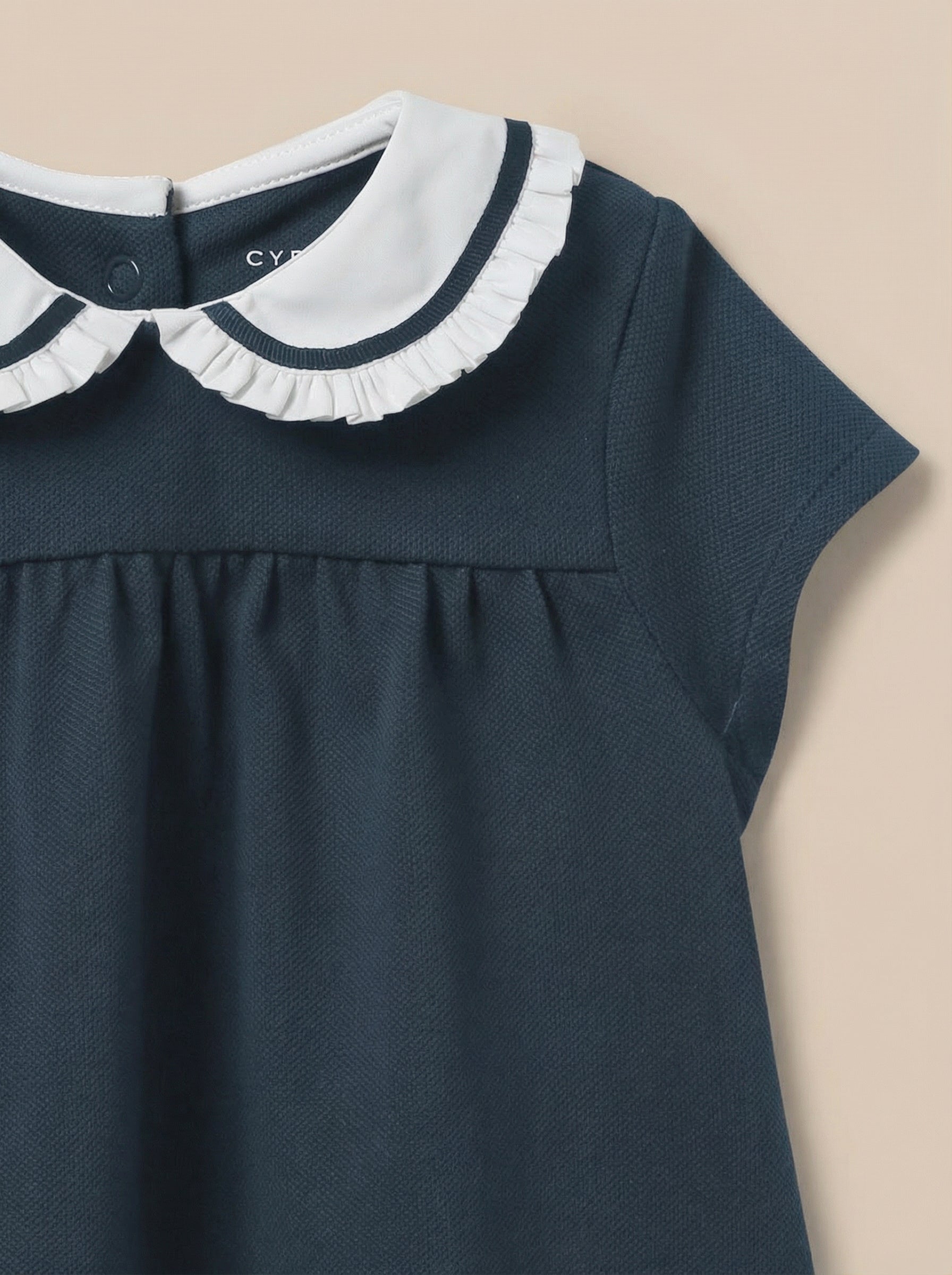 Babyjurk in piquétricot - Biologisch katoen