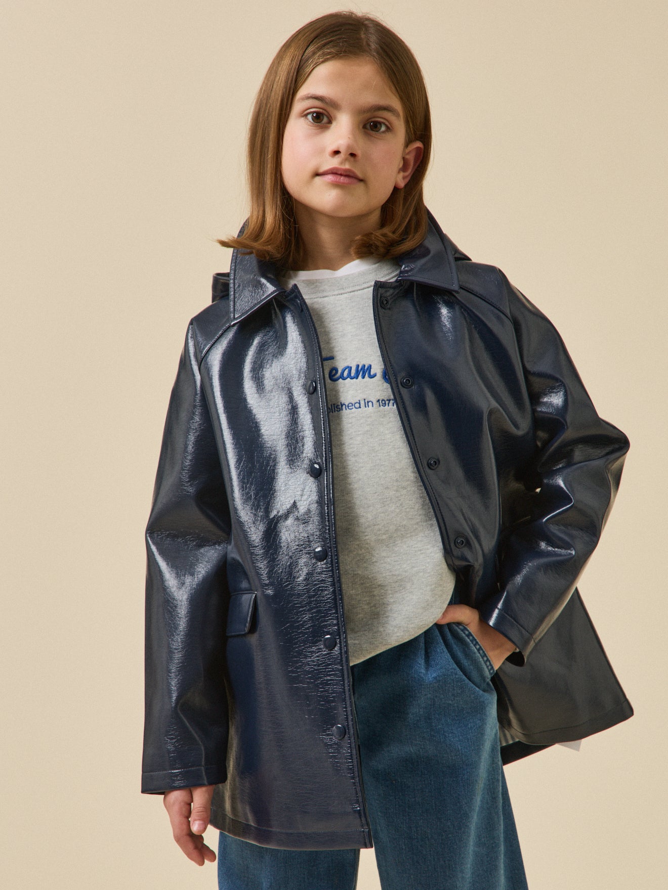 Meisjesregenjas in vinyl met kap