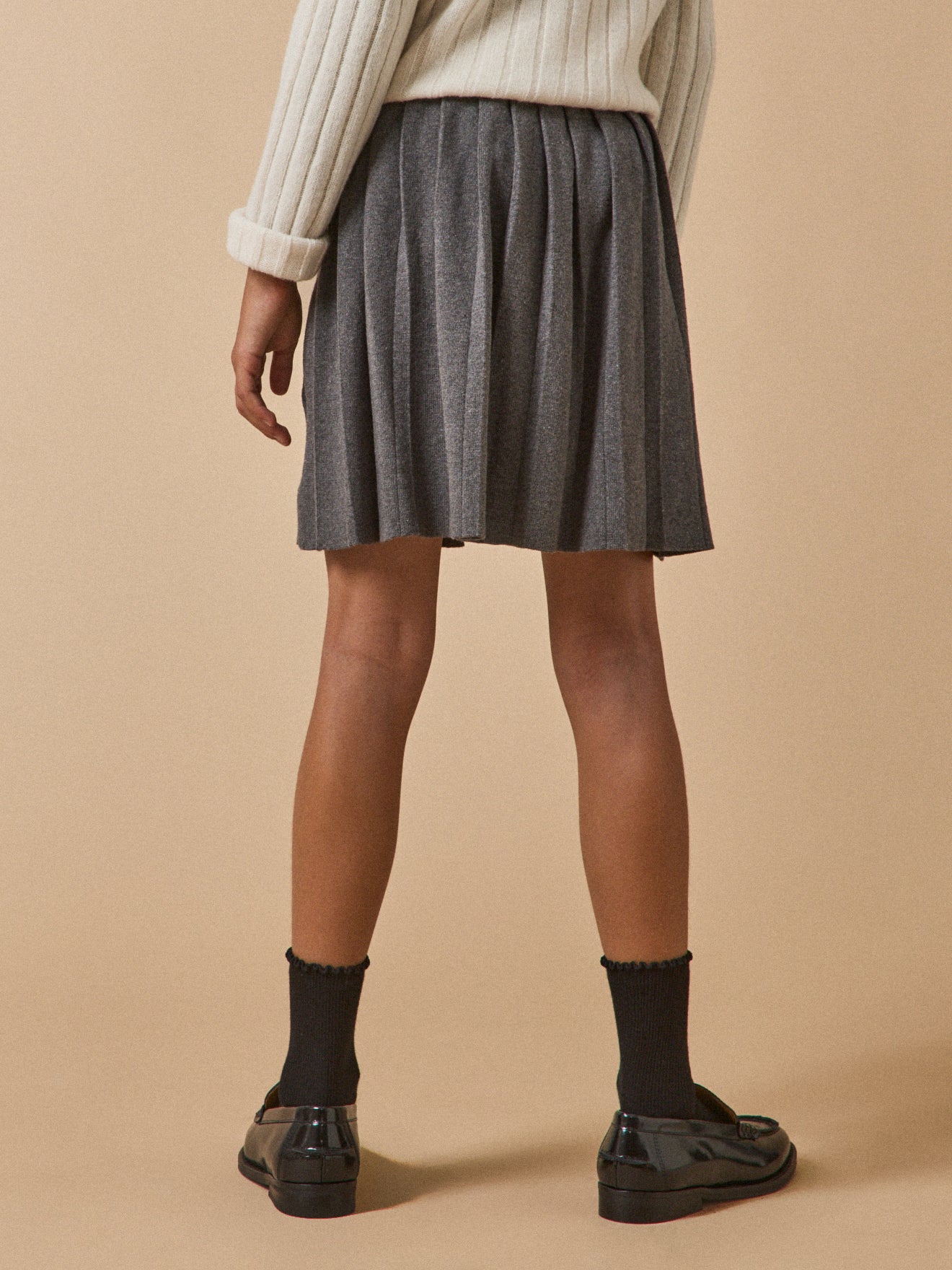 Meisjesrok in tricot met plissé