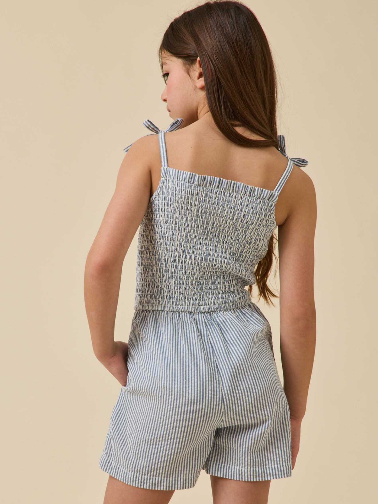 Meisjesplaysuit in seersucker