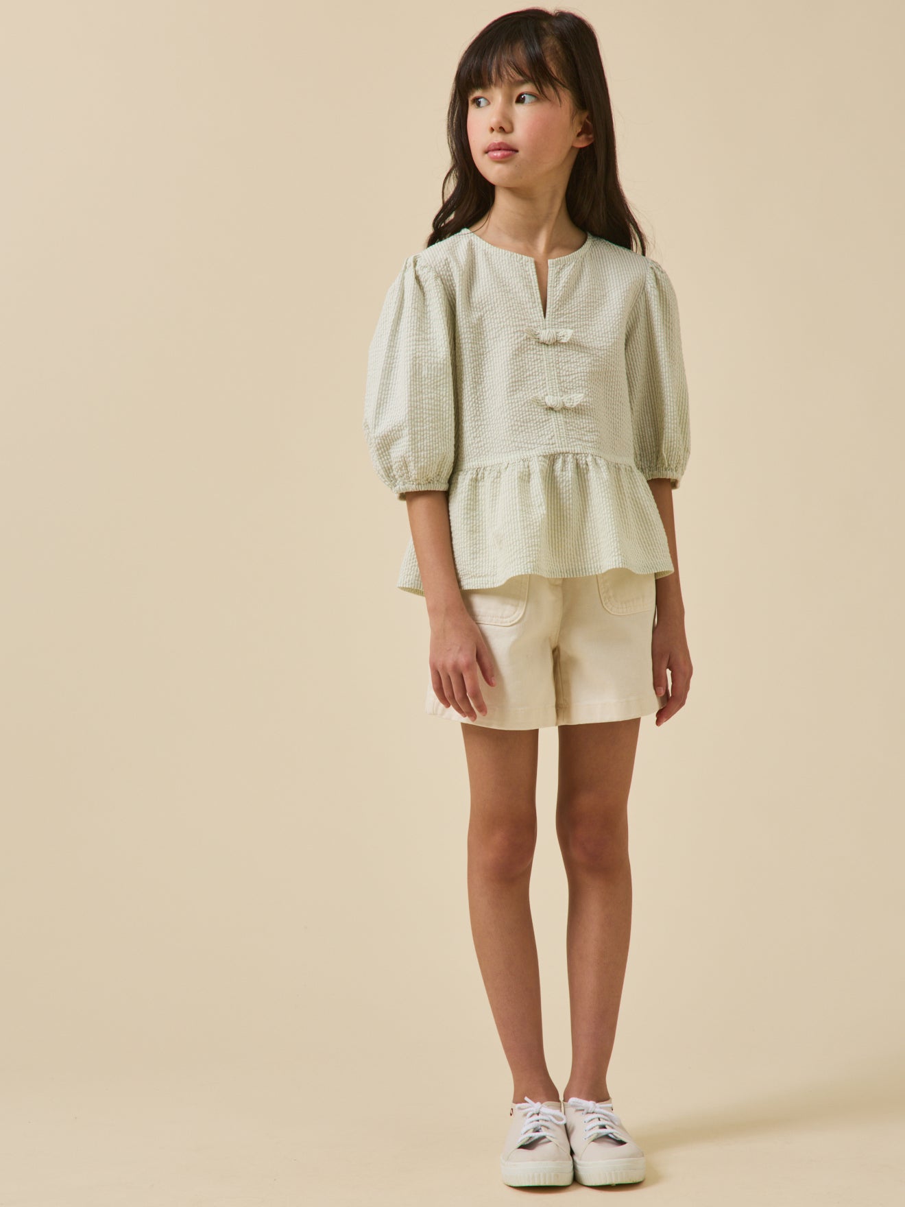 Gestreepte meisjesbloes in seersucker