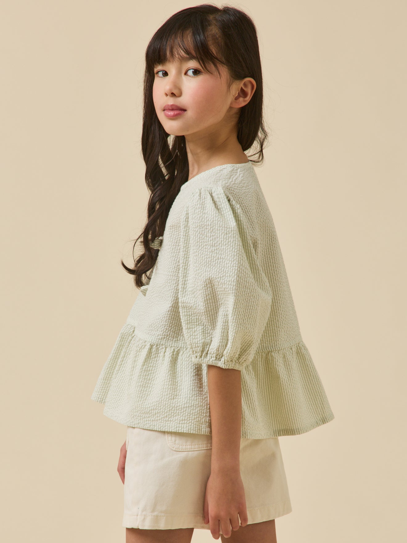 Gestreepte meisjesbloes in seersucker