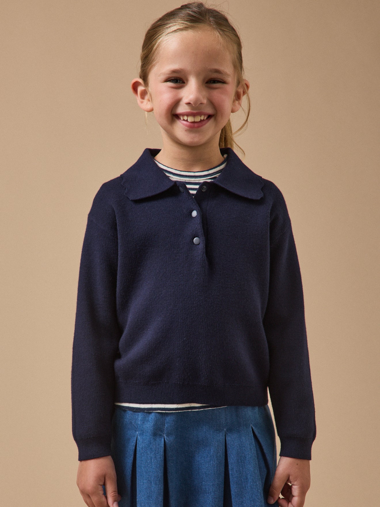 Meisjestrui in milanotricot met polokraag