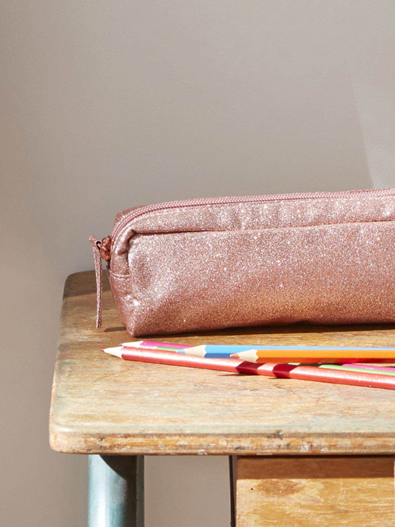 Trousse enduite paillettes