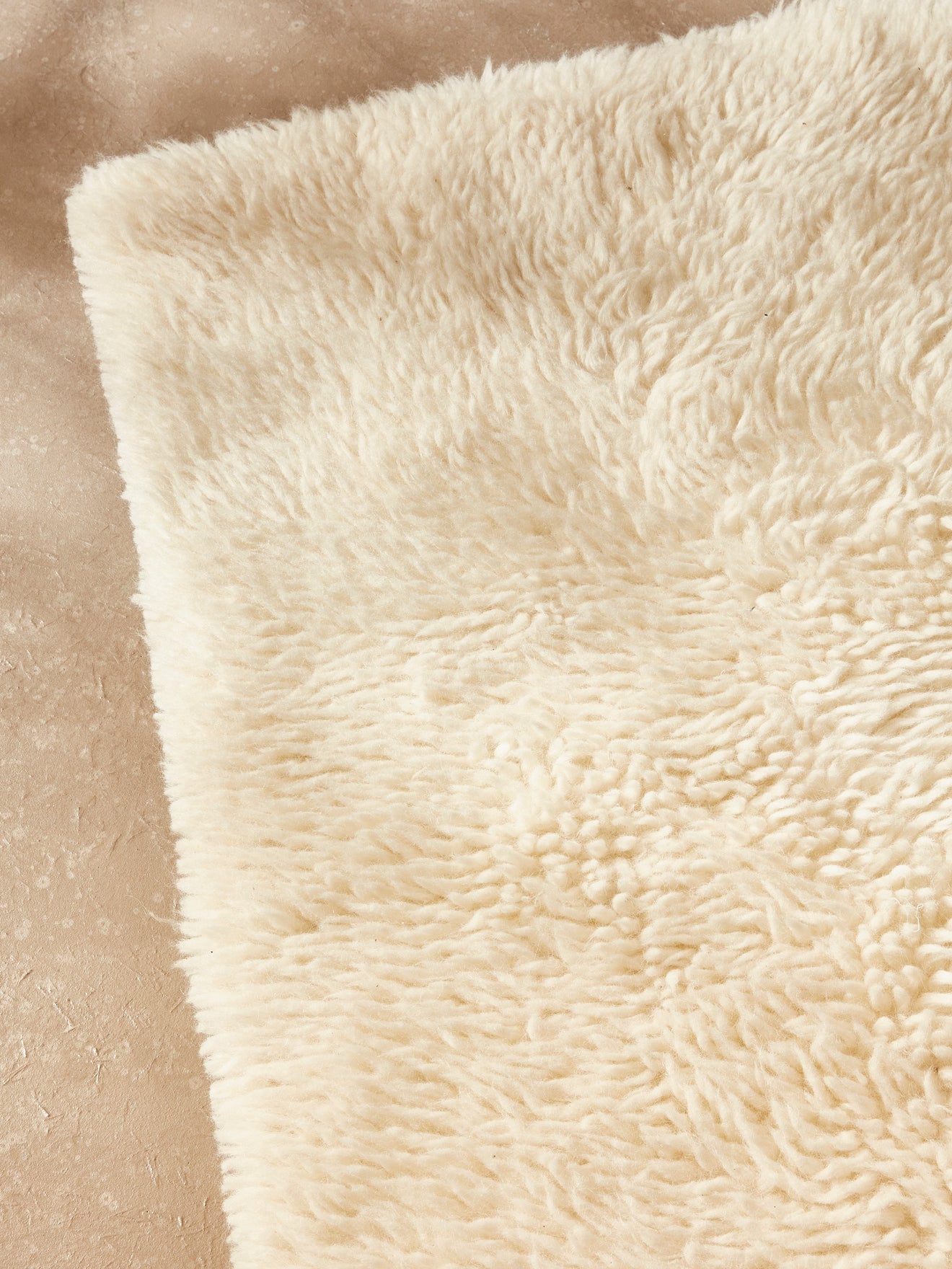 Petit tapis poils longs pure laine