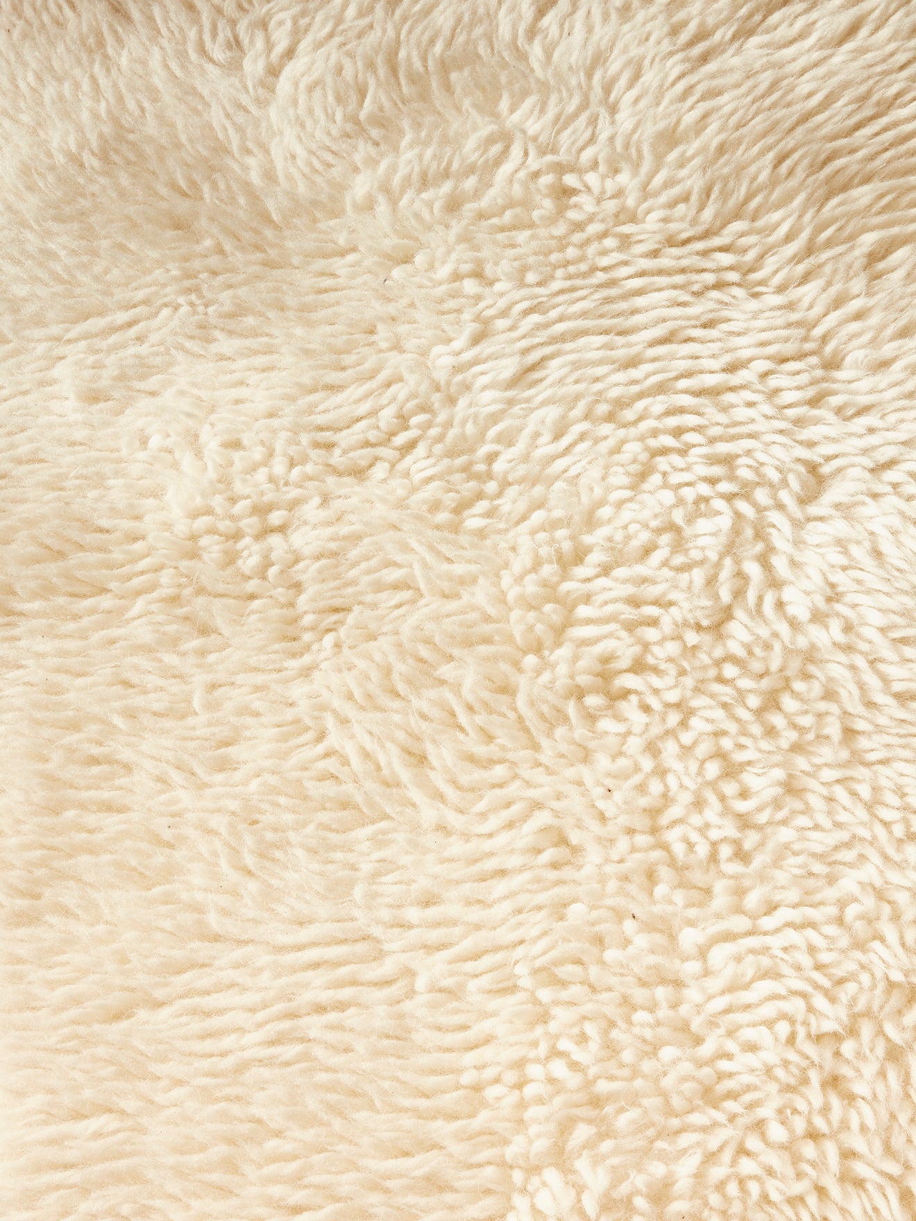 Petit tapis poils longs pure laine