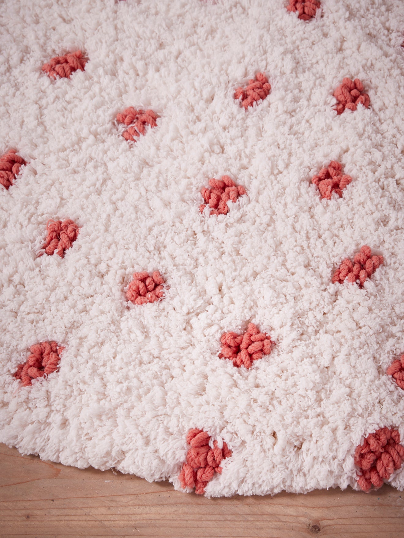 Tapis rond tufté à pois