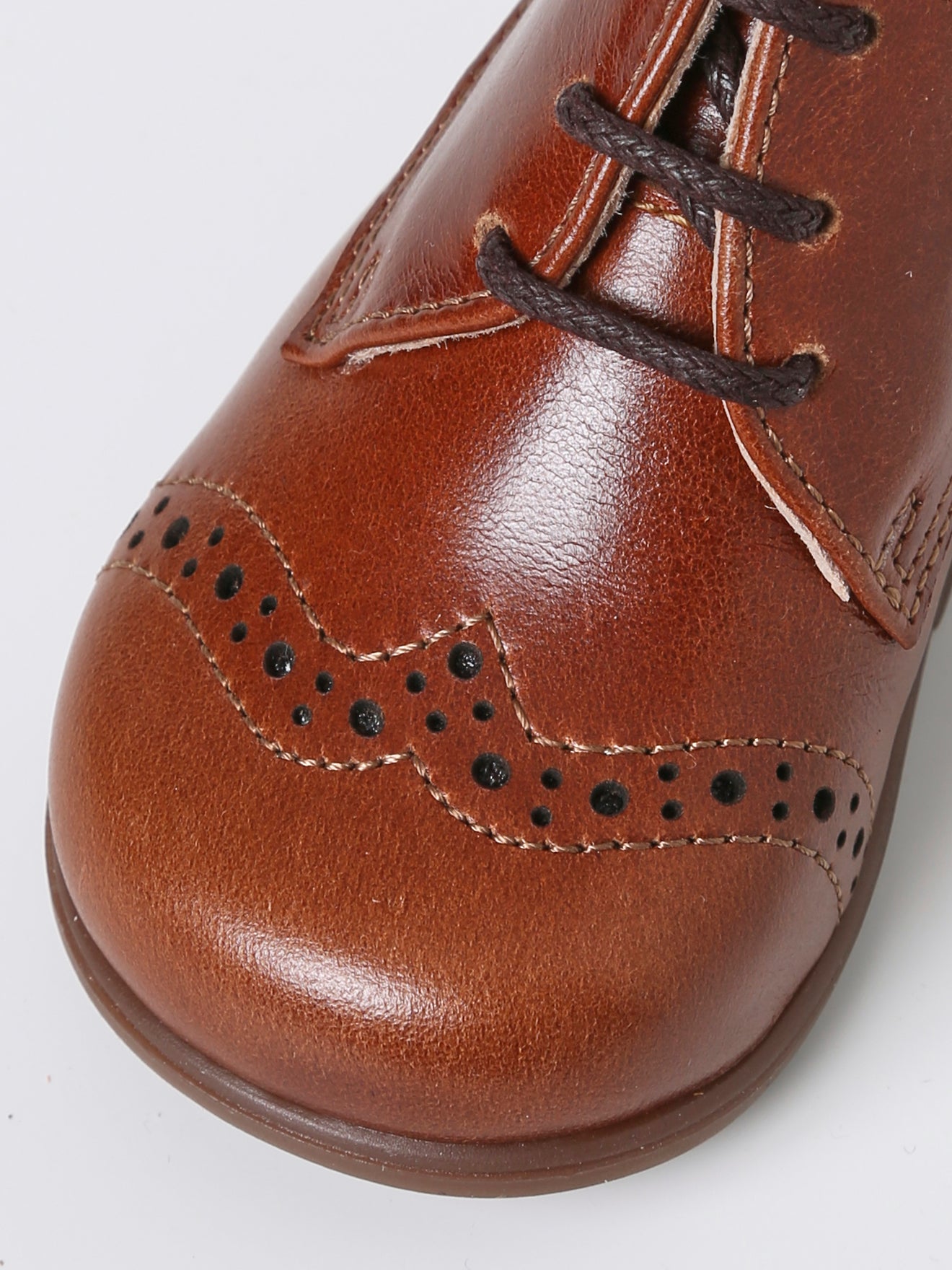 Bottines bout fleuri en cuir bébé