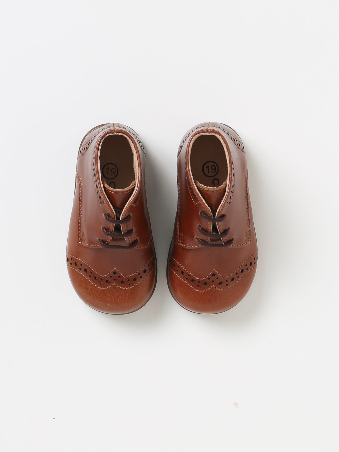 Bottines bout fleuri en cuir bébé